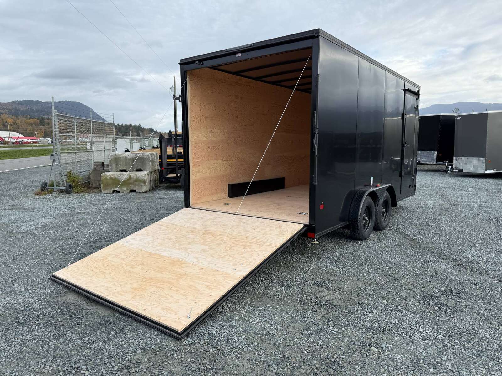 Photo of 2026 Royal 7.5X16 V-NOSE RAMP DOOR EXTRA HEIGHT Cargo / Enclosed Trailer Black w/ Blackout Package 7700lb GVW