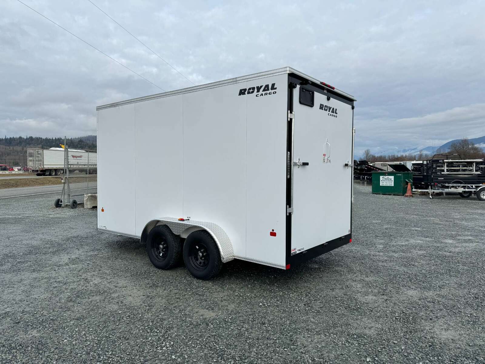 Photo of 2026 Royal Cargo 7X14 V Nose 7700LB GVW RAMP DOOR White Enclosed Cargo Trailer Extra Tall