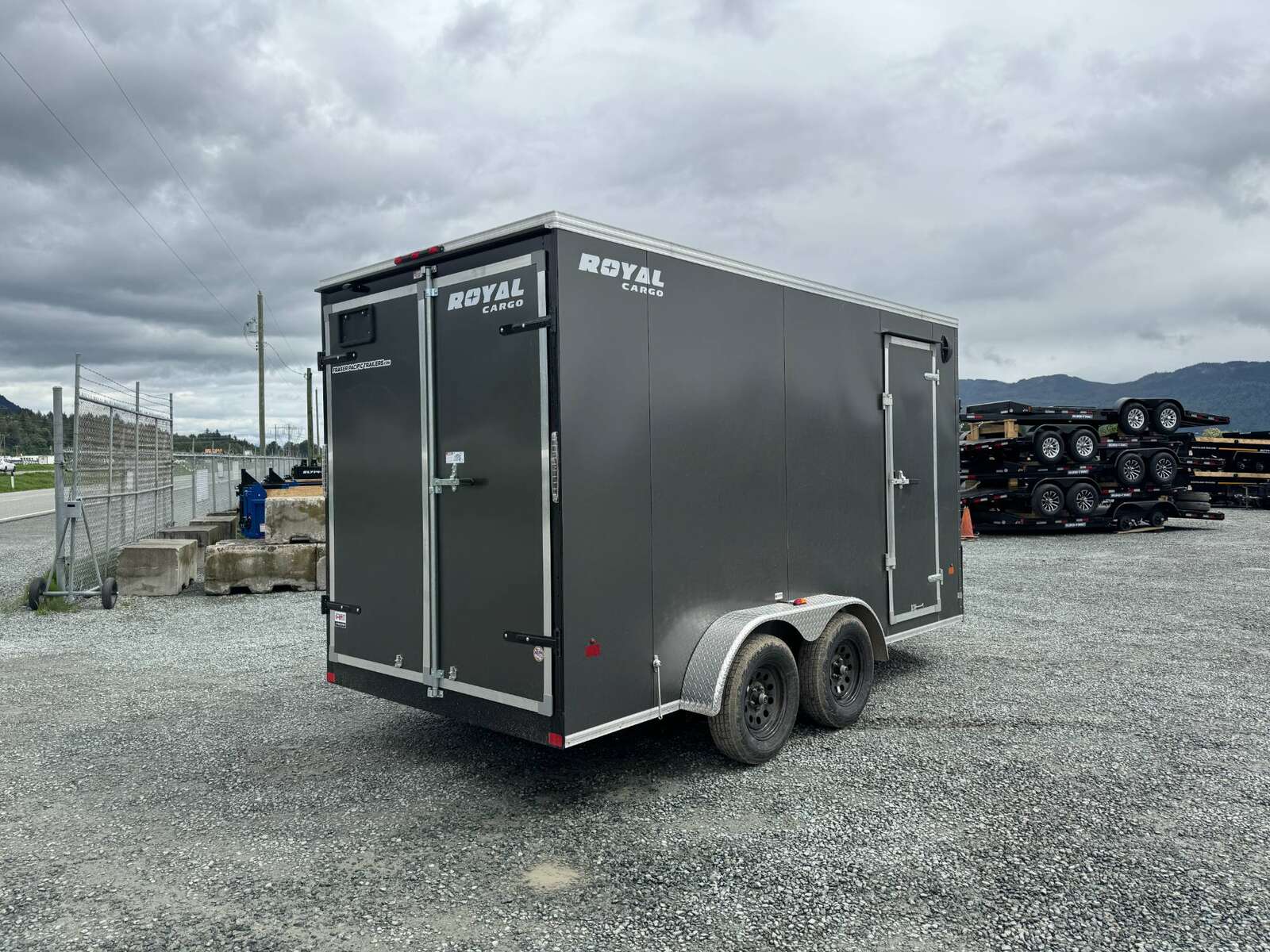 Photo of 2026 Royal Cargo 7X14 V Nose 7700LB GVW BARN DOORS Charcoal Grey Enclosed Trailer Extra Tall