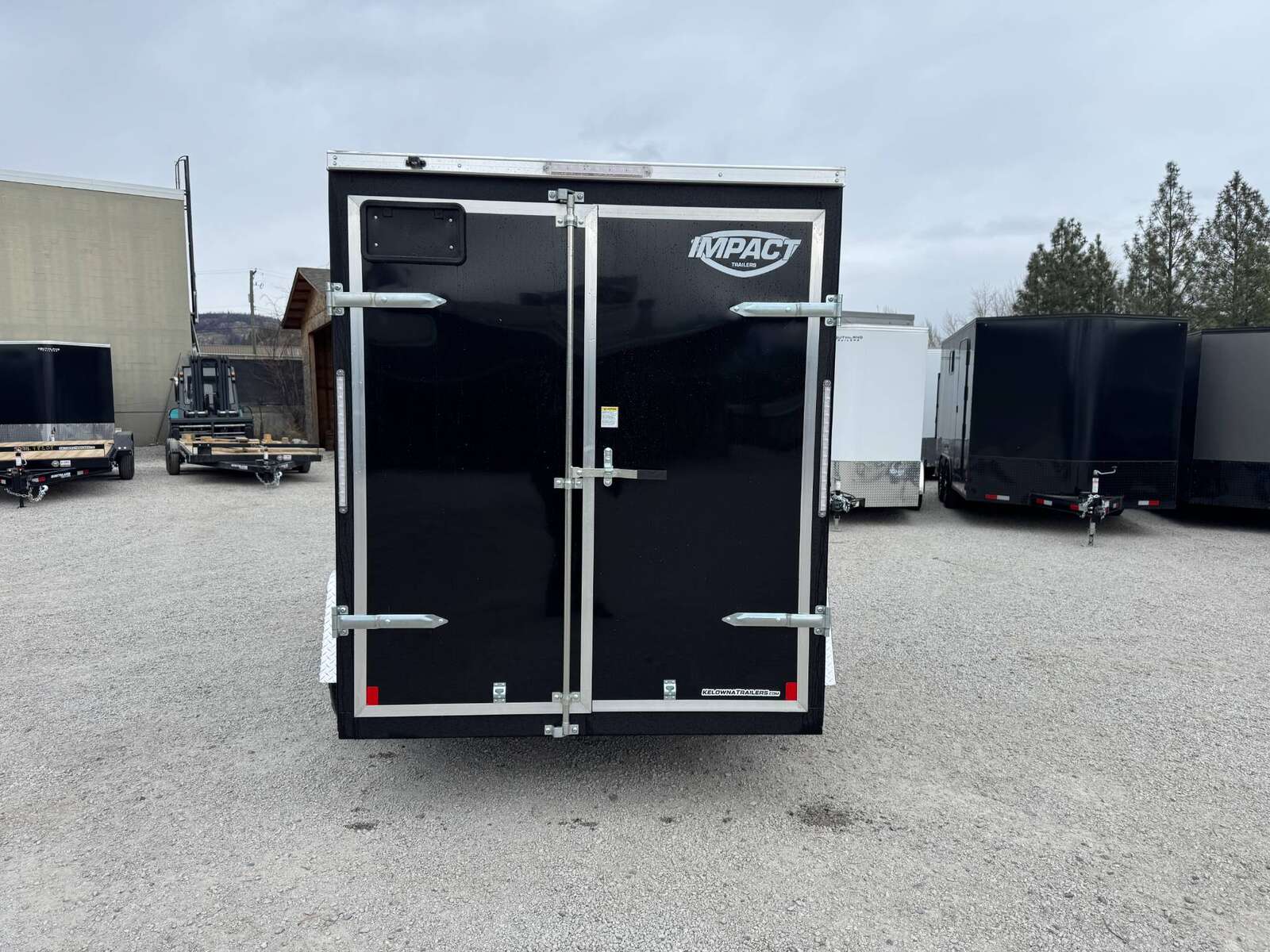 Photo of 2026 Impact Quake 6x10 V Nose Enclosed Cargo Trailer Barn Doors Black Extra Height 2990lb GVW