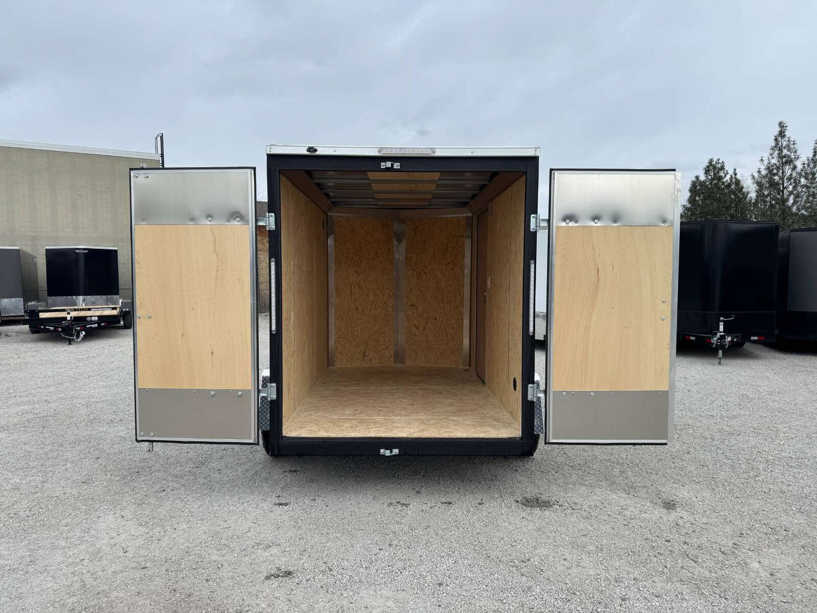 Photo of 2026 Impact Quake 6x10 V Nose Enclosed Cargo Trailer Barn Doors Black Extra Height 2990lb GVW