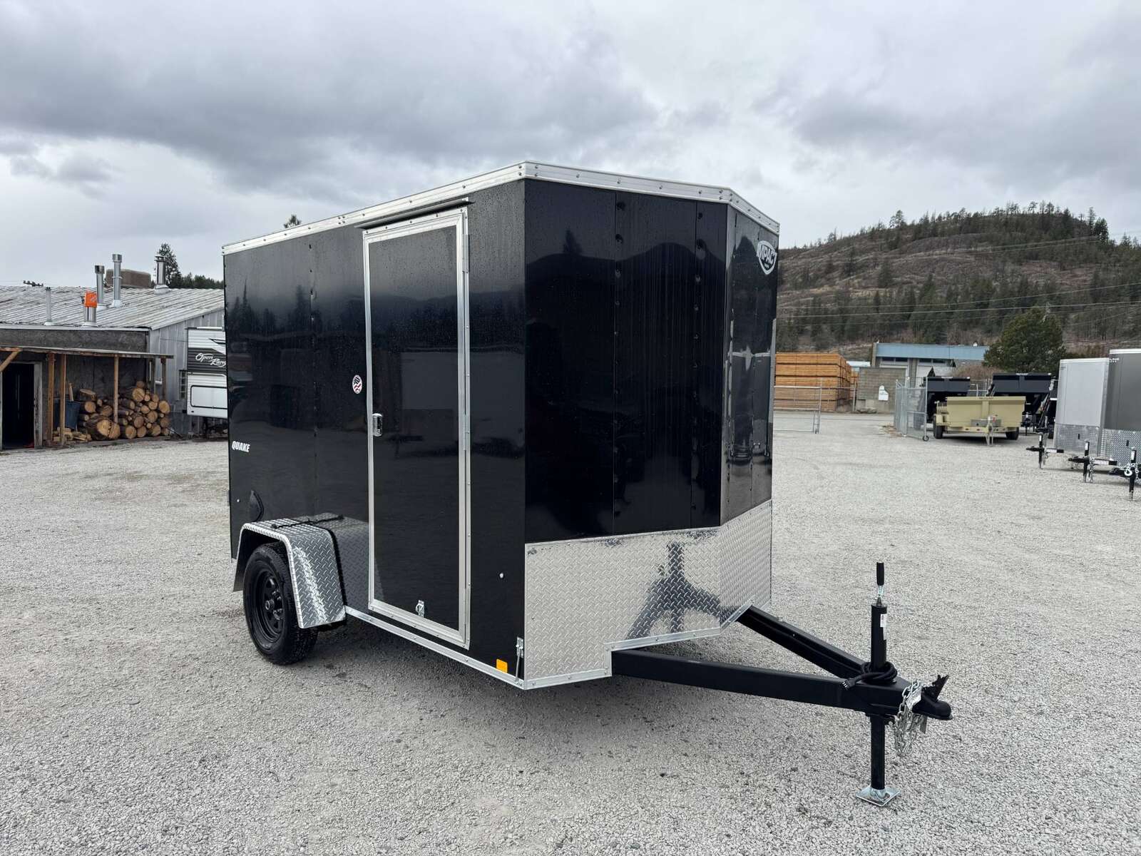 Photo of 2026 Impact Quake 6x10 V Nose Enclosed Cargo Trailer Barn Doors Black Extra Height 2990lb GVW