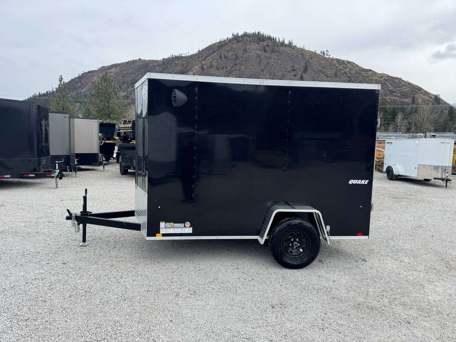 Photo of 2026 Impact Quake 6x10 V Nose Enclosed Cargo Trailer Barn Doors Black Extra Height 2990lb GVW
