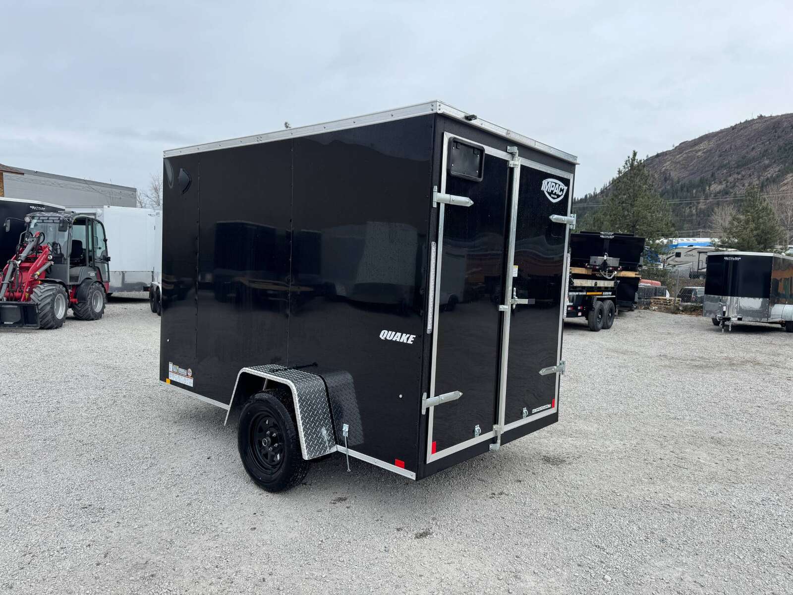 Photo of 2026 Impact Quake 6x10 V Nose Enclosed Cargo Trailer Barn Doors Black Extra Height 2990lb GVW