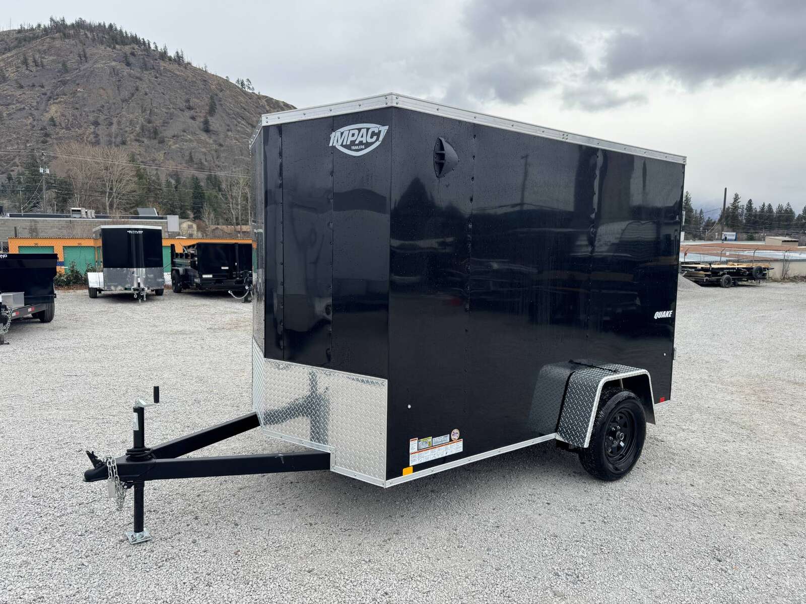 Photo of 2026 Impact Quake 6x10 V Nose Enclosed Cargo Trailer Barn Doors Black Extra Height 2990lb GVW