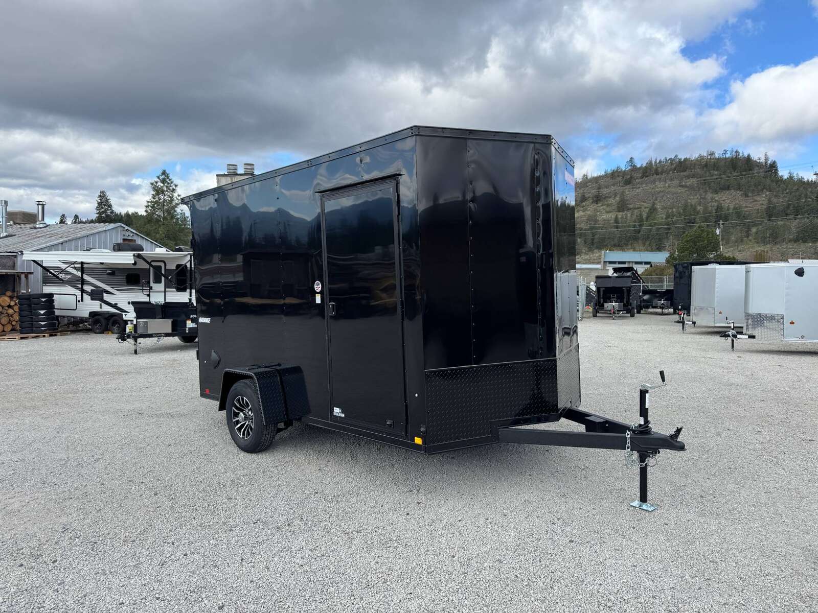 Photo of 2026 Impact Quake 7x12 V Nose Cargo / Enclosed Trailer 5000lb GVW w/ Ramp Door