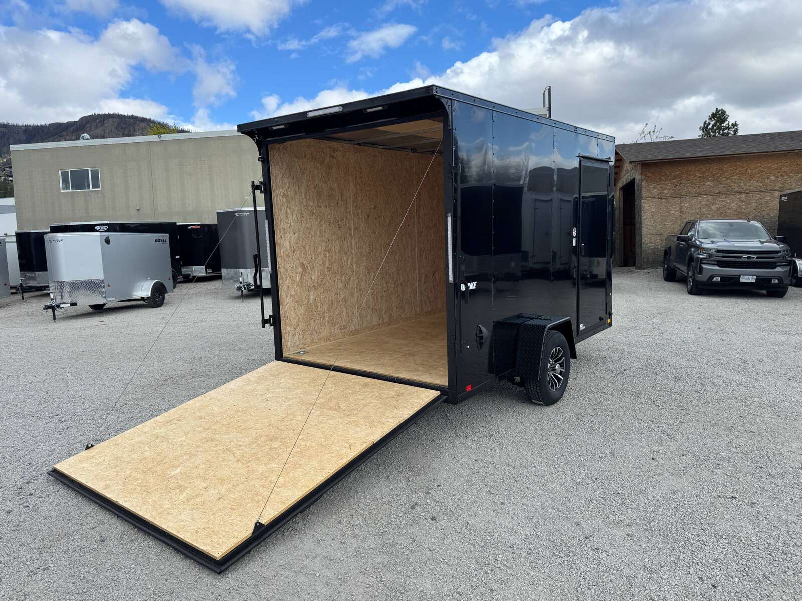 Photo of 2026 Impact Quake 7x12 V Nose Cargo / Enclosed Trailer 5000lb GVW w/ Ramp Door