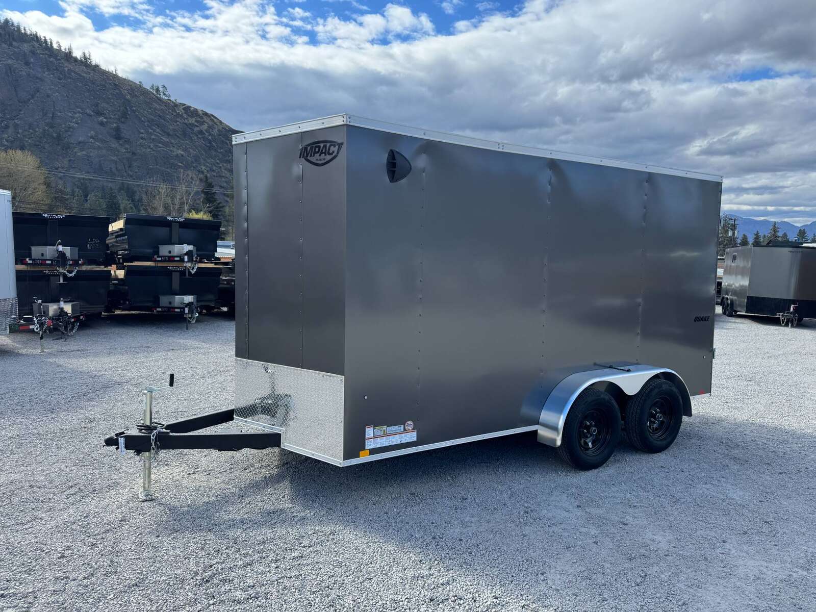 Photo of **Scratch Sale** 2026 Impact 7x14 Quake V Nose Cargo Enclosed Trailer Barn Doors Extra Height Charcoal Grey 7000lb GVW