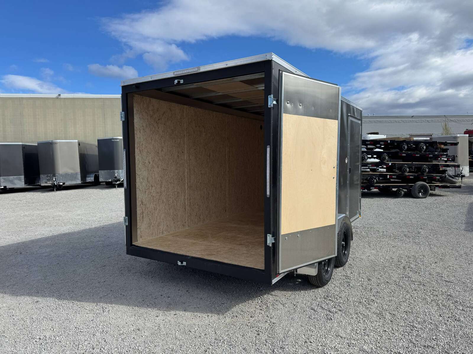 Photo of **Scratch Sale** 2026 Impact 7x14 Quake V Nose Cargo Enclosed Trailer Barn Doors Extra Height Charcoal Grey 7000lb GVW