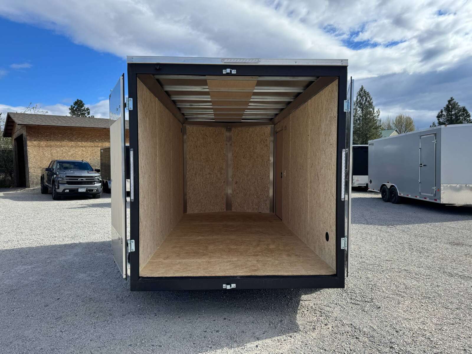 Photo of **Scratch Sale** 2026 Impact 7x14 Quake V Nose Cargo Enclosed Trailer Barn Doors Extra Height Charcoal Grey 7000lb GVW