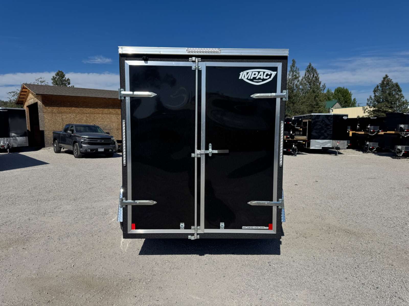 Photo of 2026 Impact Quake 6x10 V Nose Enclosed Cargo Trailer Barn Doors Black Extra Height 2990lb GVW