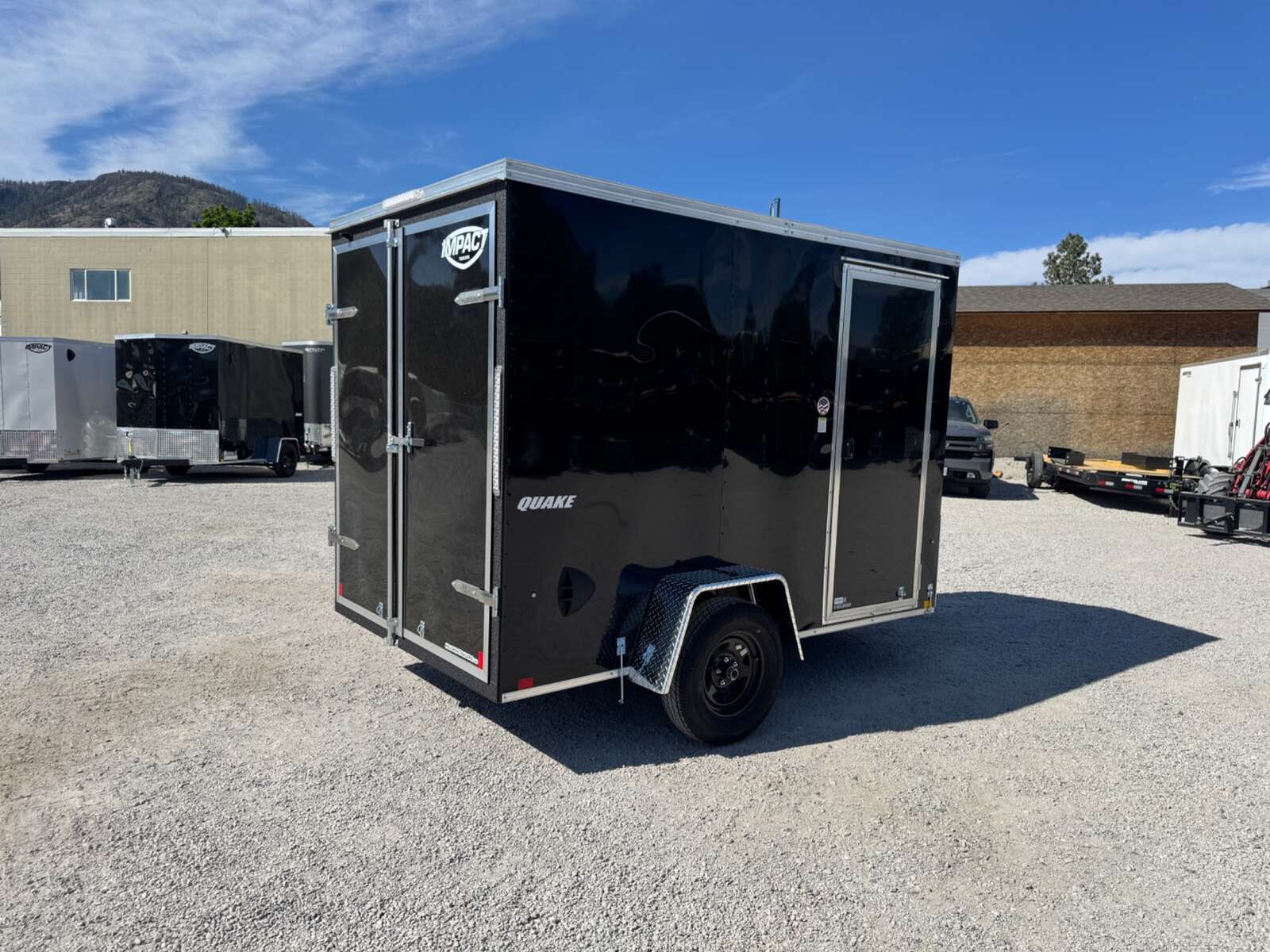 Photo of 2026 Impact Quake 6x10 V Nose Enclosed Cargo Trailer Barn Doors Black Extra Height 2990lb GVW