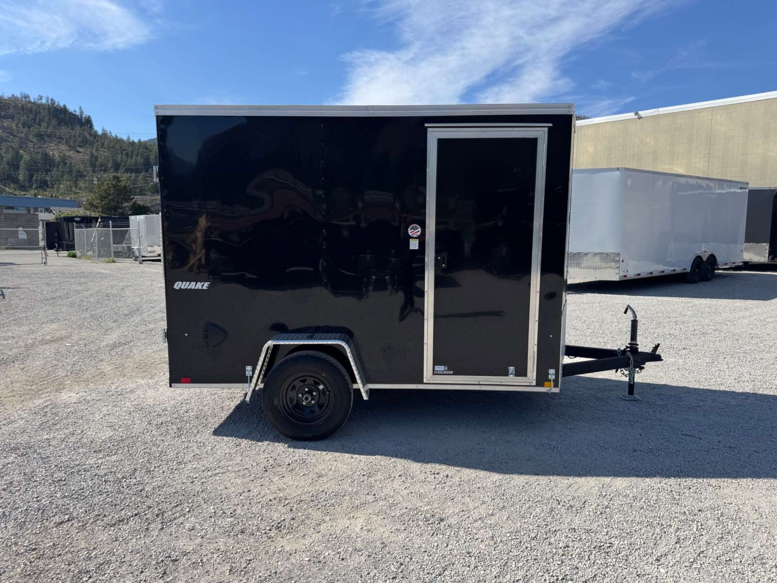 Photo of 2026 Impact Quake 6x10 V Nose Enclosed Cargo Trailer Barn Doors Black Extra Height 2990lb GVW