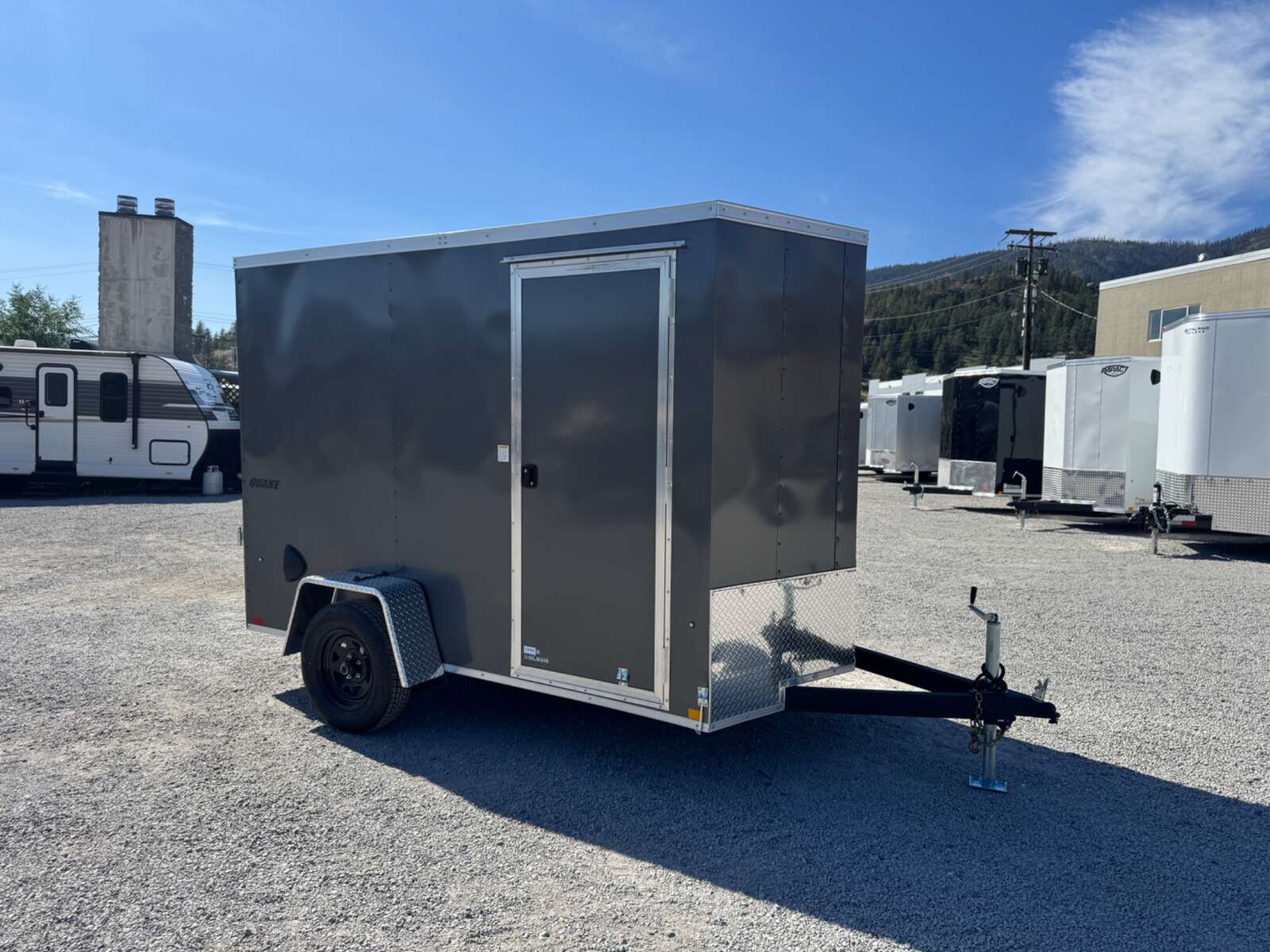 Photo of 2026 Impact Quake 6x10 V Nose Enclosed Cargo Trailer Ramp Door Charcoal Grey Extra Height 2990lb GVW