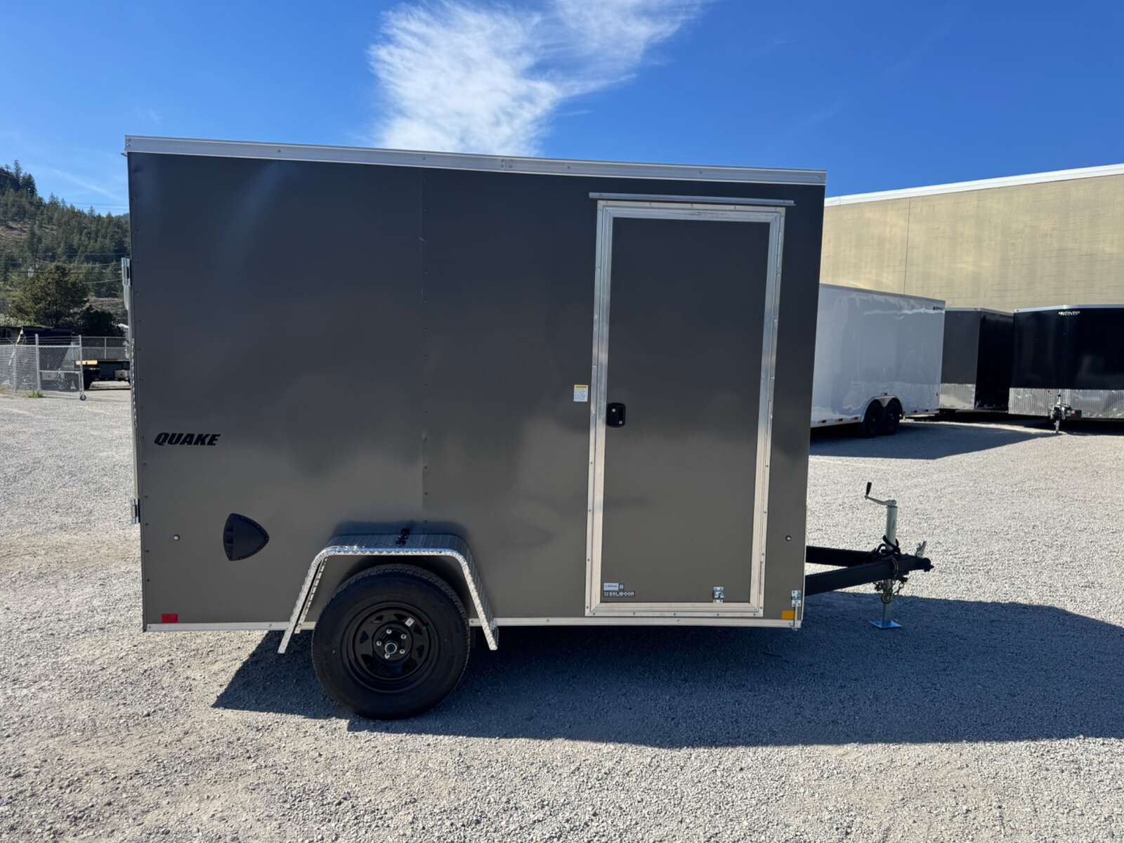 Photo of 2026 Impact Quake 6x10 V Nose Enclosed Cargo Trailer Ramp Door Charcoal Grey Extra Height 2990lb GVW