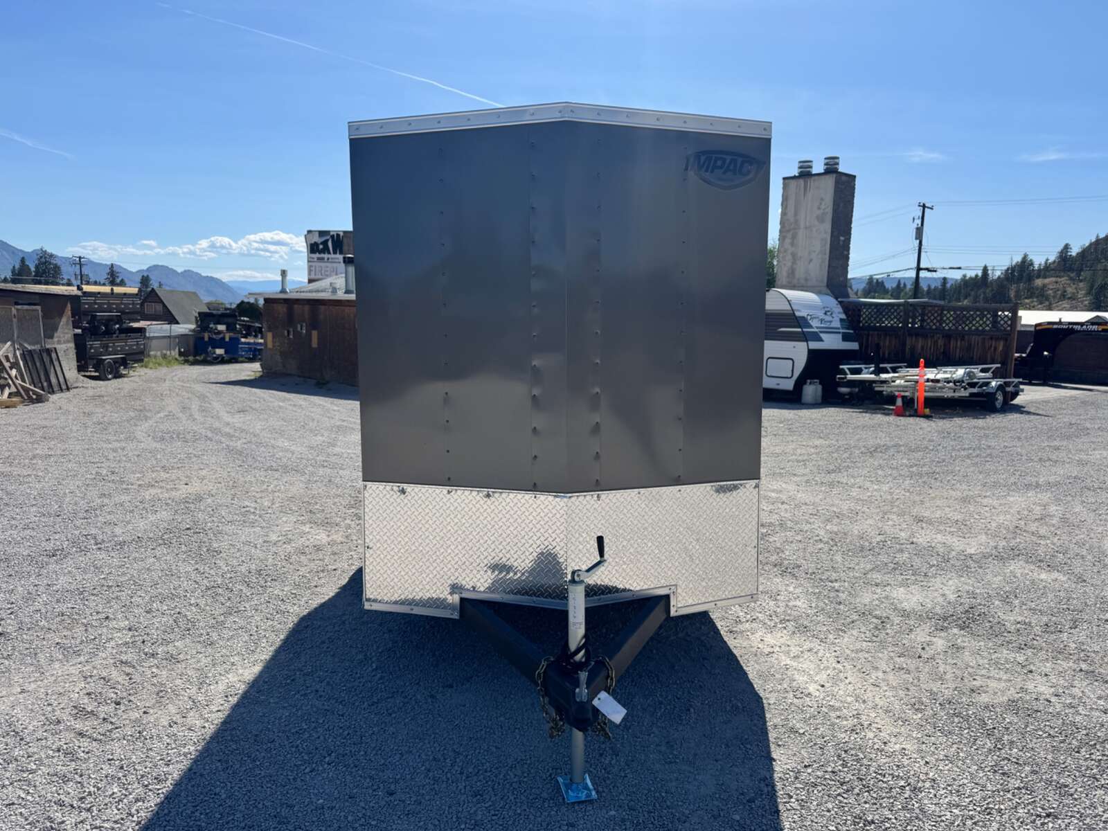Photo of 2026 Impact Quake 6x10 V Nose Enclosed Cargo Trailer Ramp Door Charcoal Grey Extra Height 2990lb GVW