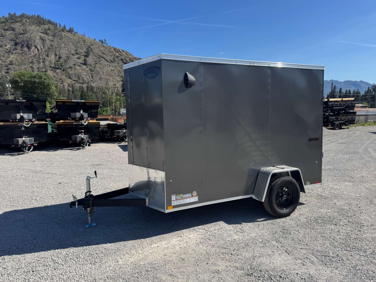 Photo of 2026 Impact Quake 6x10 V Nose Enclosed Cargo Trailer Ramp Door Charcoal Grey Extra Height 2990lb GVW