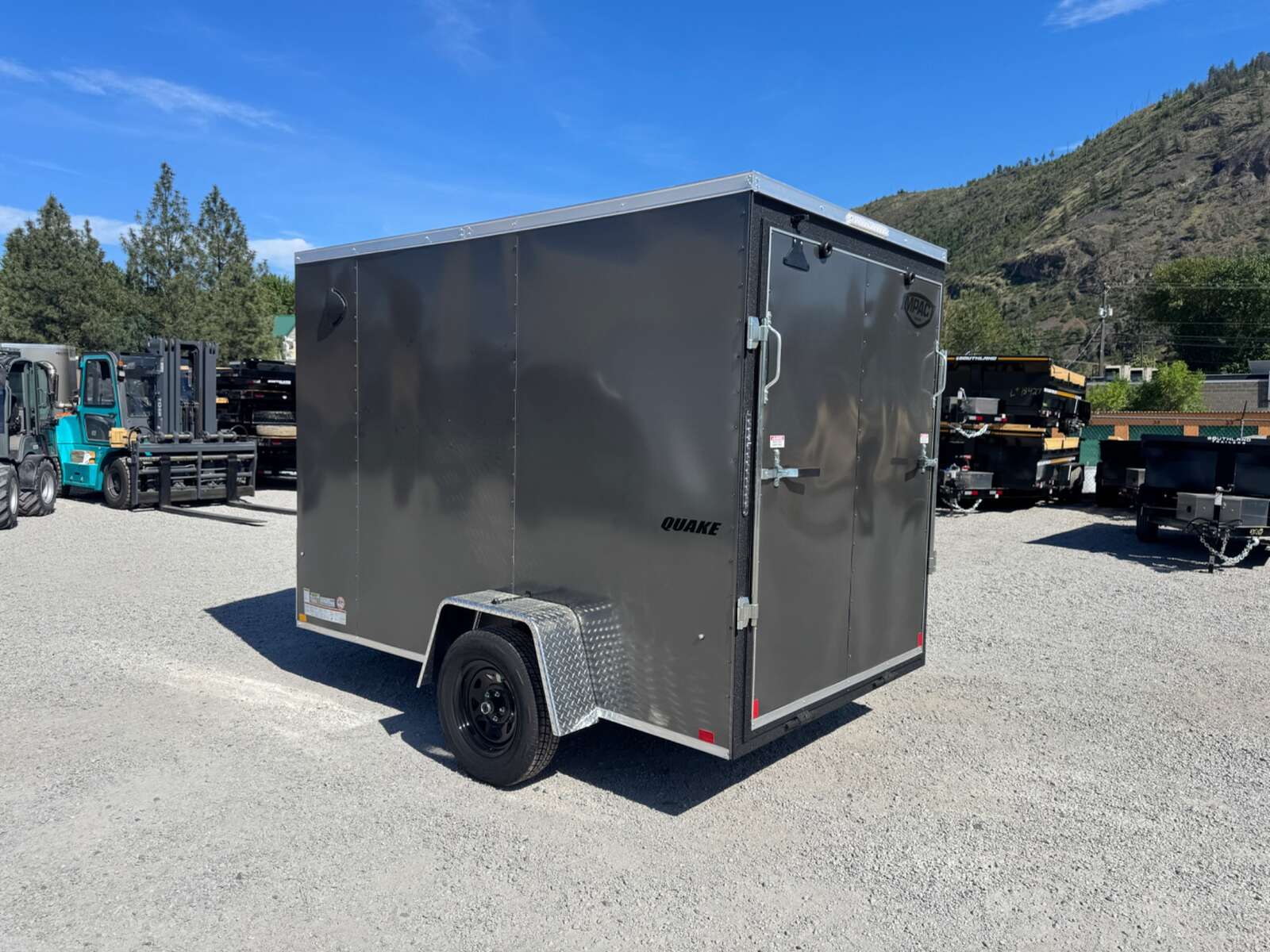 Photo of 2026 Impact Quake 6x10 V Nose Enclosed Cargo Trailer Ramp Door Charcoal Grey Extra Height 2990lb GVW