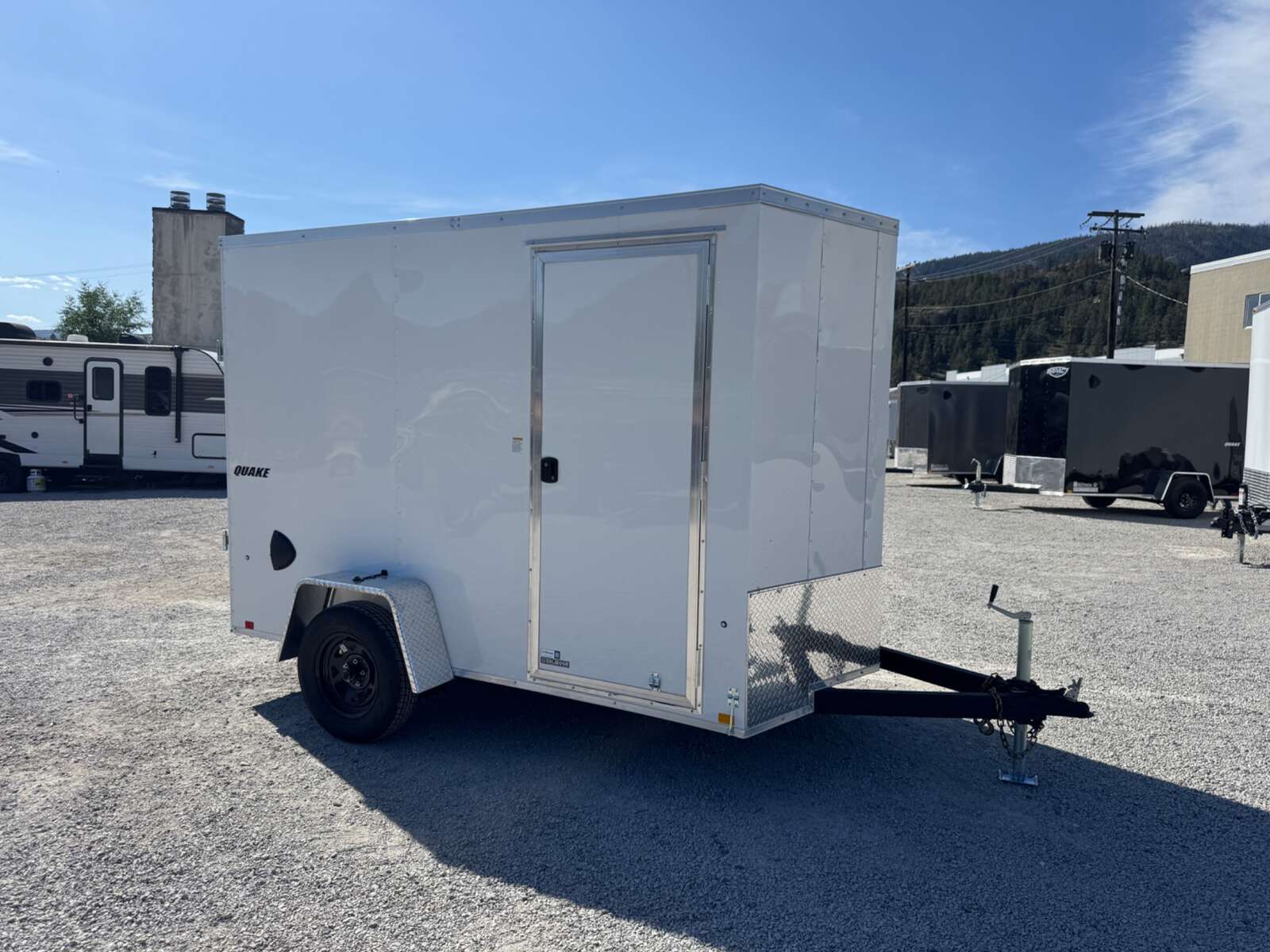 Photo of 2026 Impact Quake 6x10 V Nose Enclosed Cargo Trailer Ramp Door White Extra Height 2990lb GVW