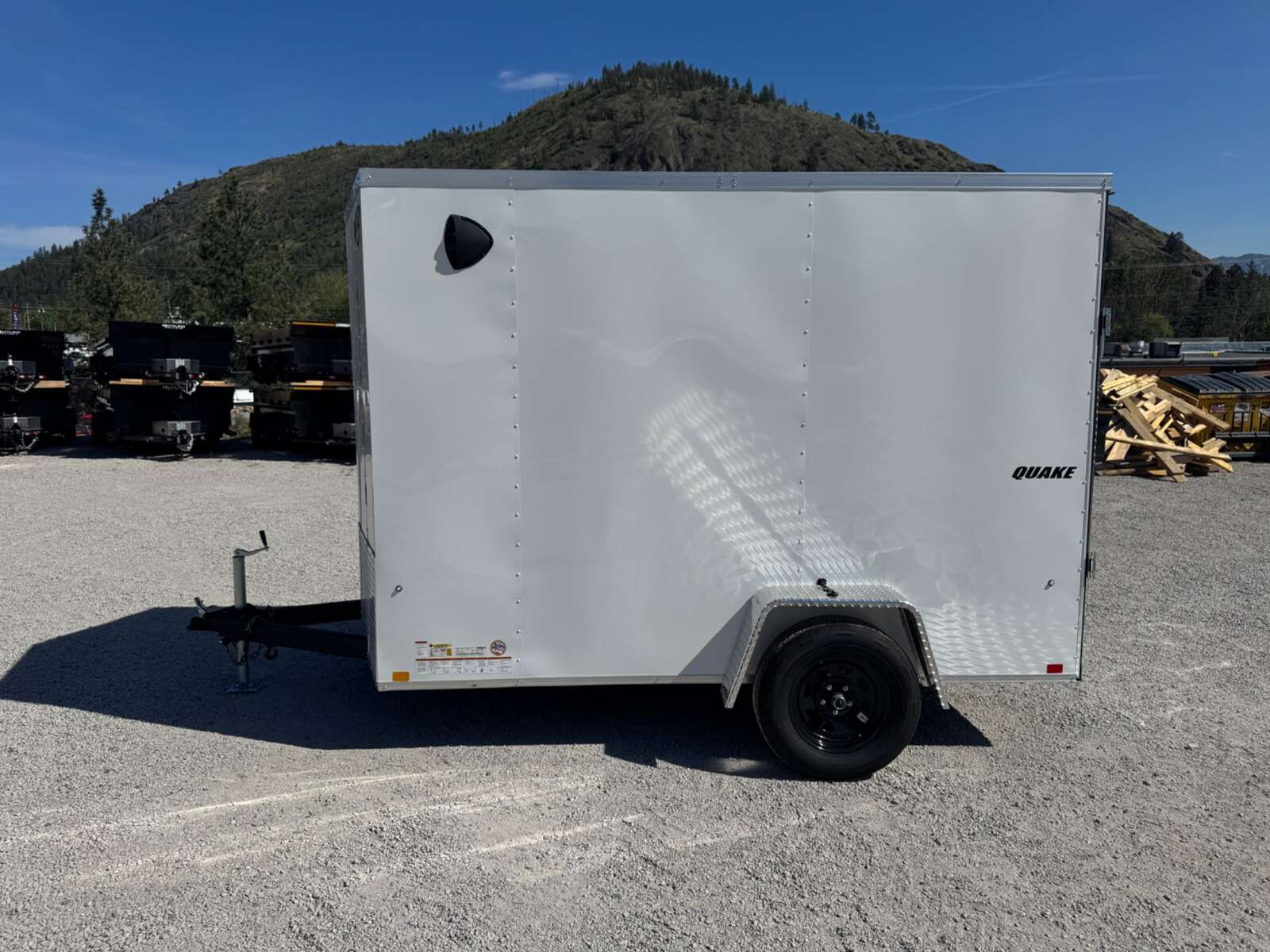 Photo of 2026 Impact Quake 6x10 V Nose Enclosed Cargo Trailer Ramp Door White Extra Height 2990lb GVW