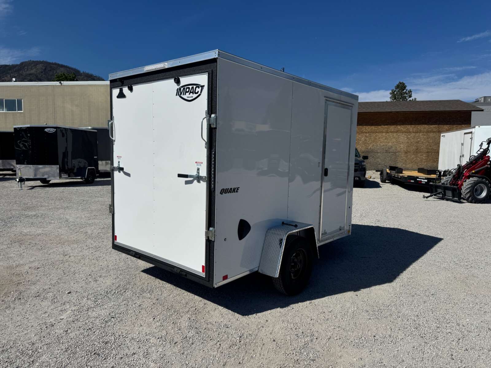 Photo of 2026 Impact Quake 6x10 V Nose Enclosed Cargo Trailer Ramp Door White Extra Height 2990lb GVW