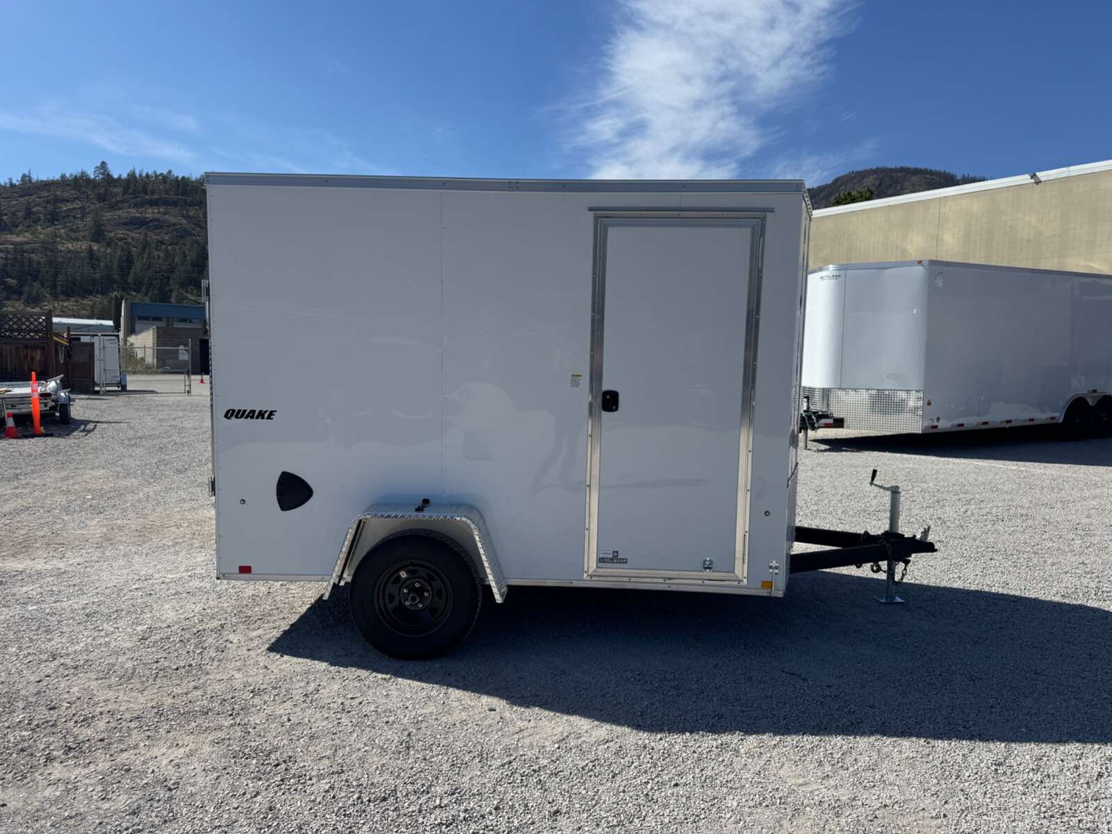 Photo of 2026 Impact Quake 6x10 V Nose Enclosed Cargo Trailer Ramp Door White Extra Height 2990lb GVW