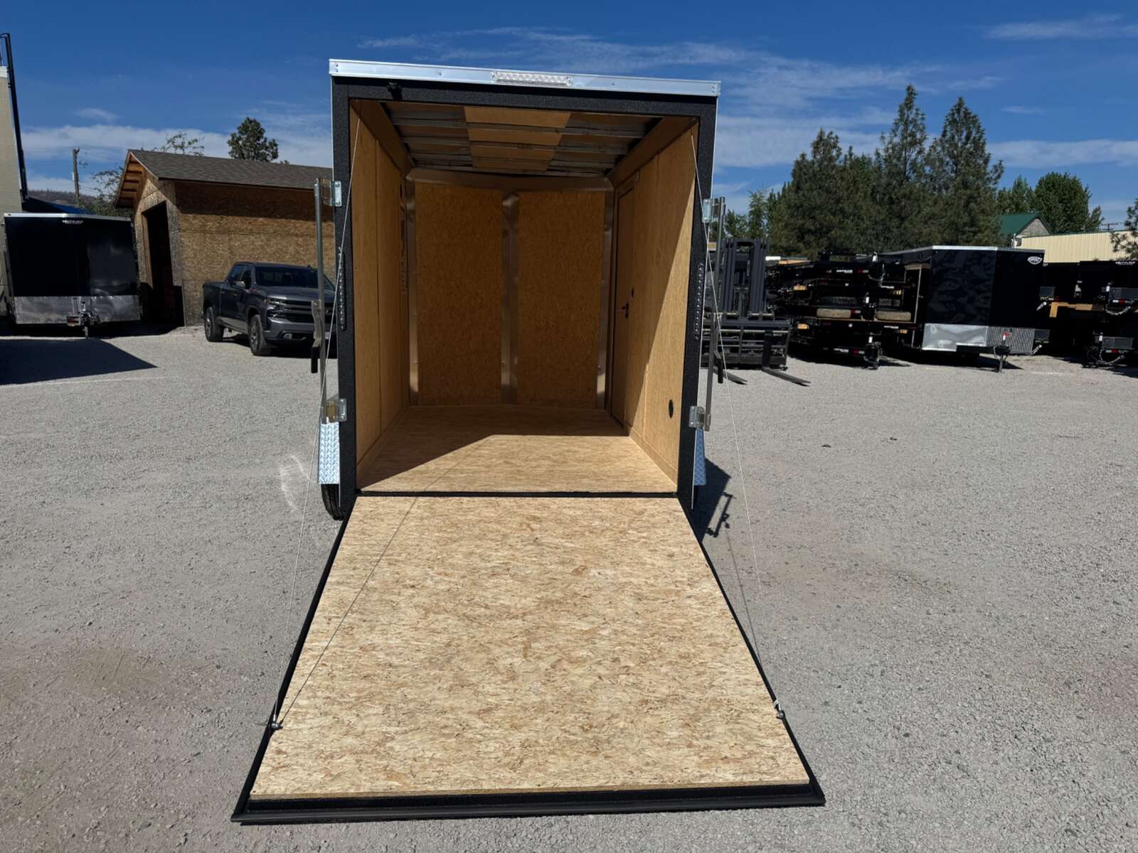Photo of 2026 Impact Quake 6x10 V Nose Enclosed Cargo Trailer Ramp Door White Extra Height 2990lb GVW