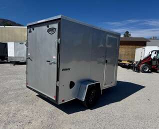 Thumbnail Photo of 2026 Impact Quake 6x10 V Nose Enclosed Cargo Trailer Ramp Door Silver Extra Height 2990lb GVW