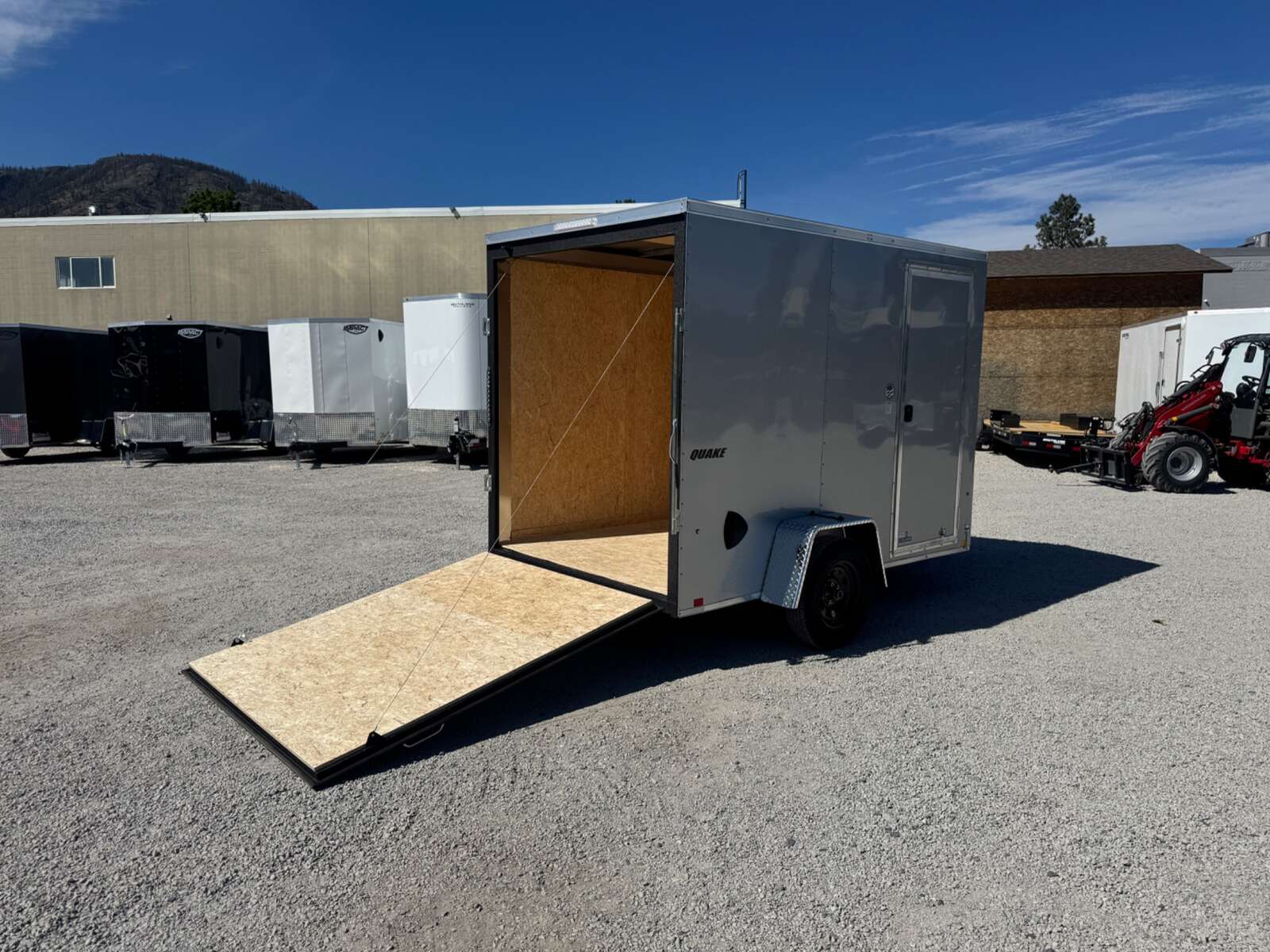 Photo of 2026 Impact Quake 6x10 V Nose Enclosed Cargo Trailer Ramp Door Silver Extra Height 2990lb GVW