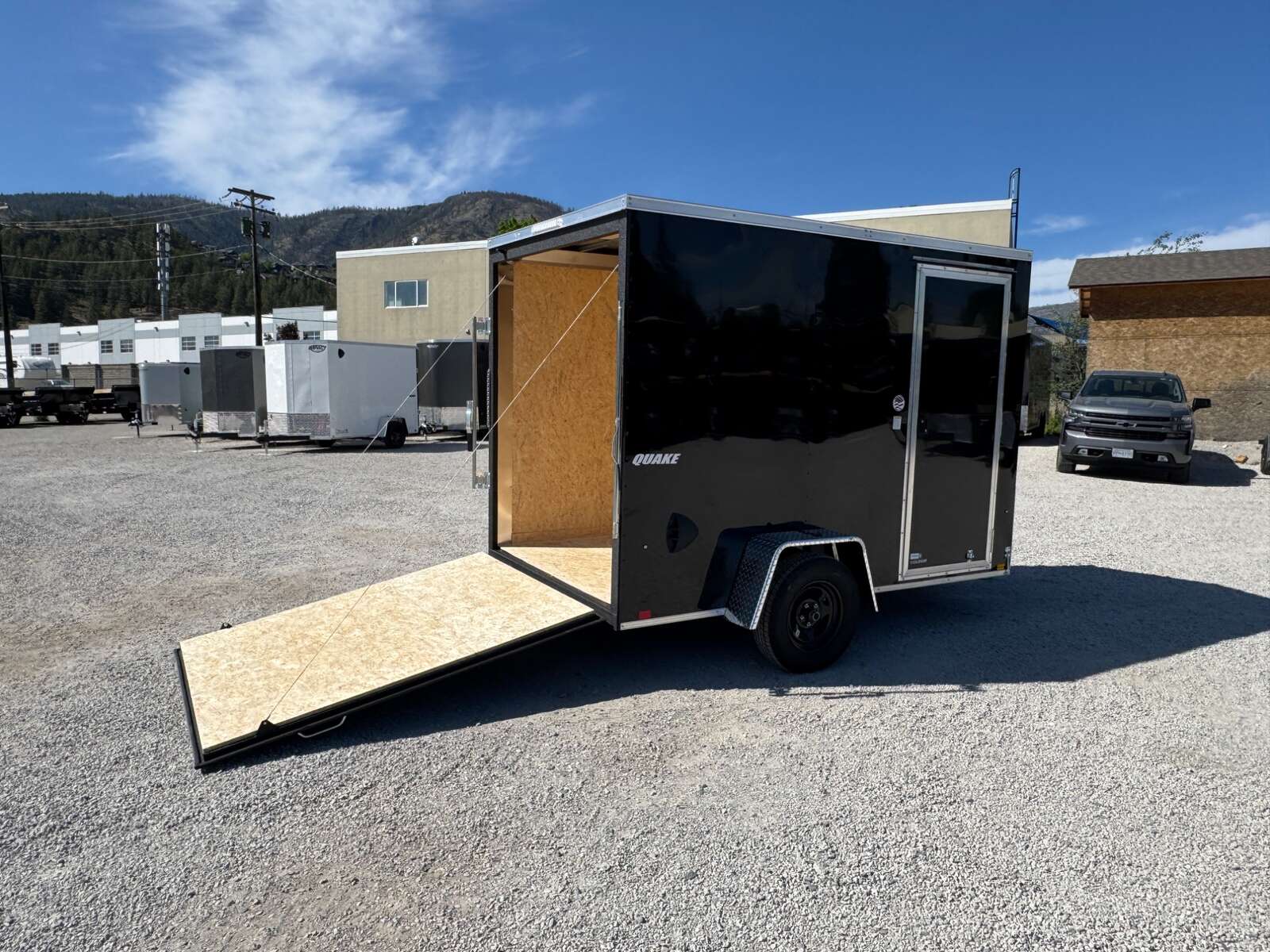 Photo of 2026 Impact Quake 6x10 V Nose Enclosed Cargo Trailer Ramp Door Black Extra Height 2990lb GVW