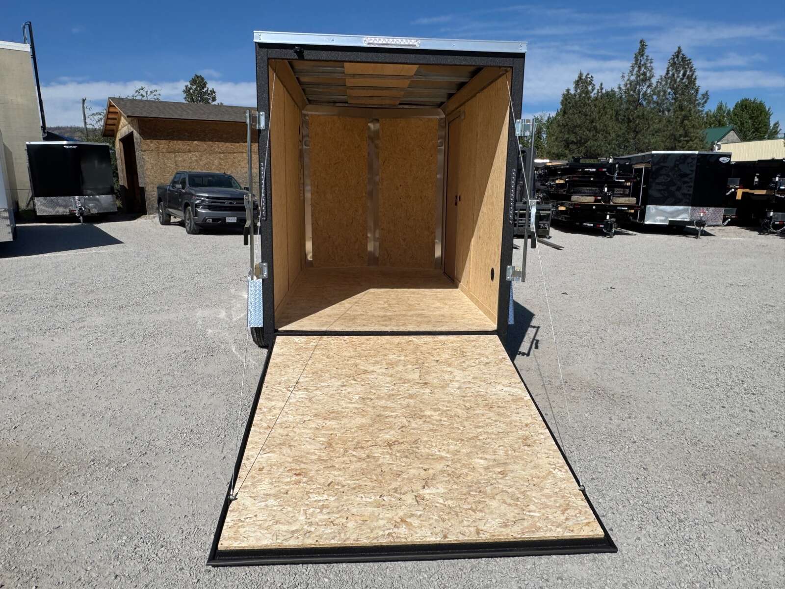 Photo of 2026 Impact Quake 6x10 V Nose Enclosed Cargo Trailer Ramp Door Black Extra Height 2990lb GVW