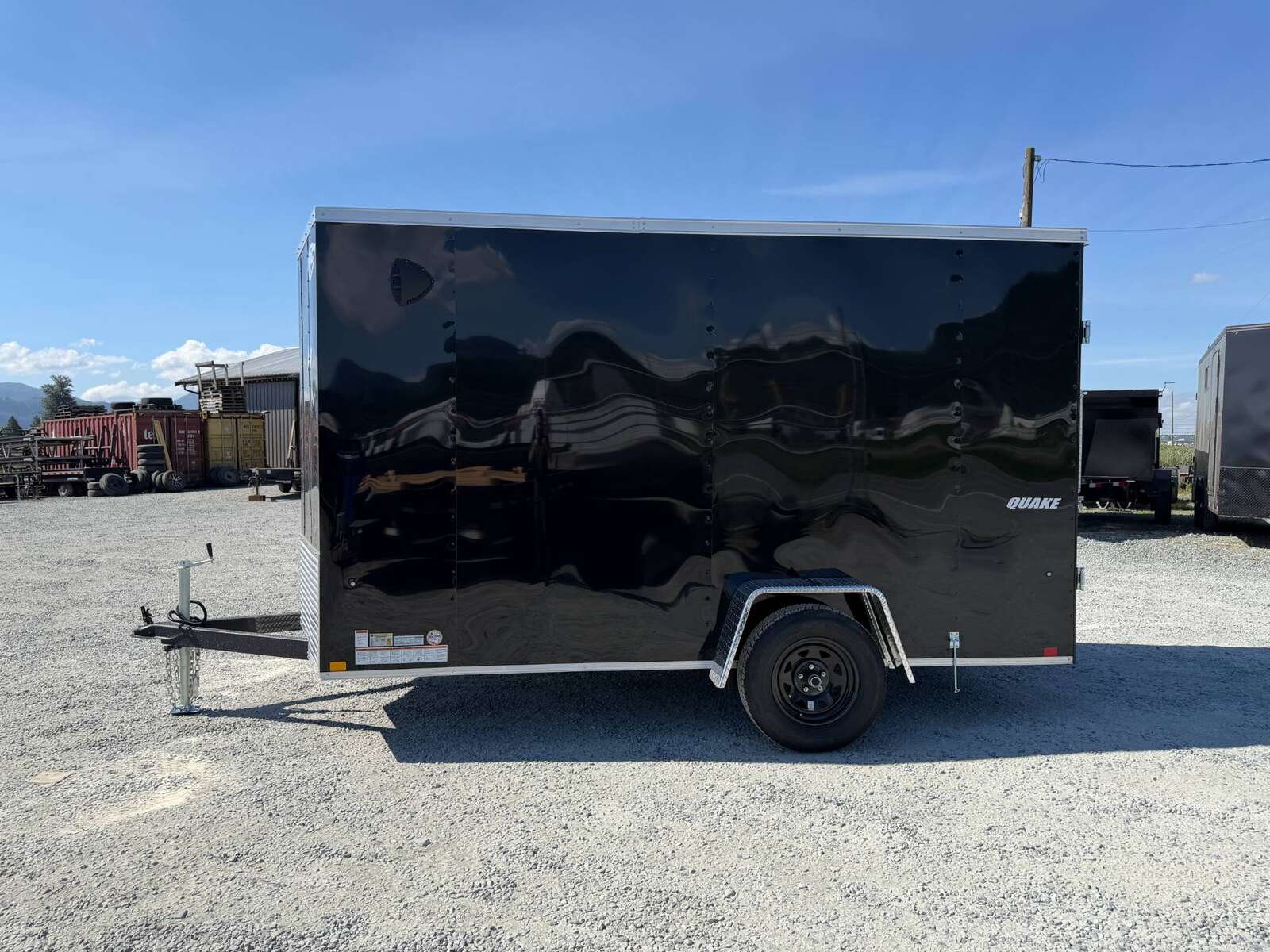 Photo of 2026 Impact Quake 6x12 V Nose Cargo / Enclosed Trailer Black Barn Door Extra Height 2990lb GVW