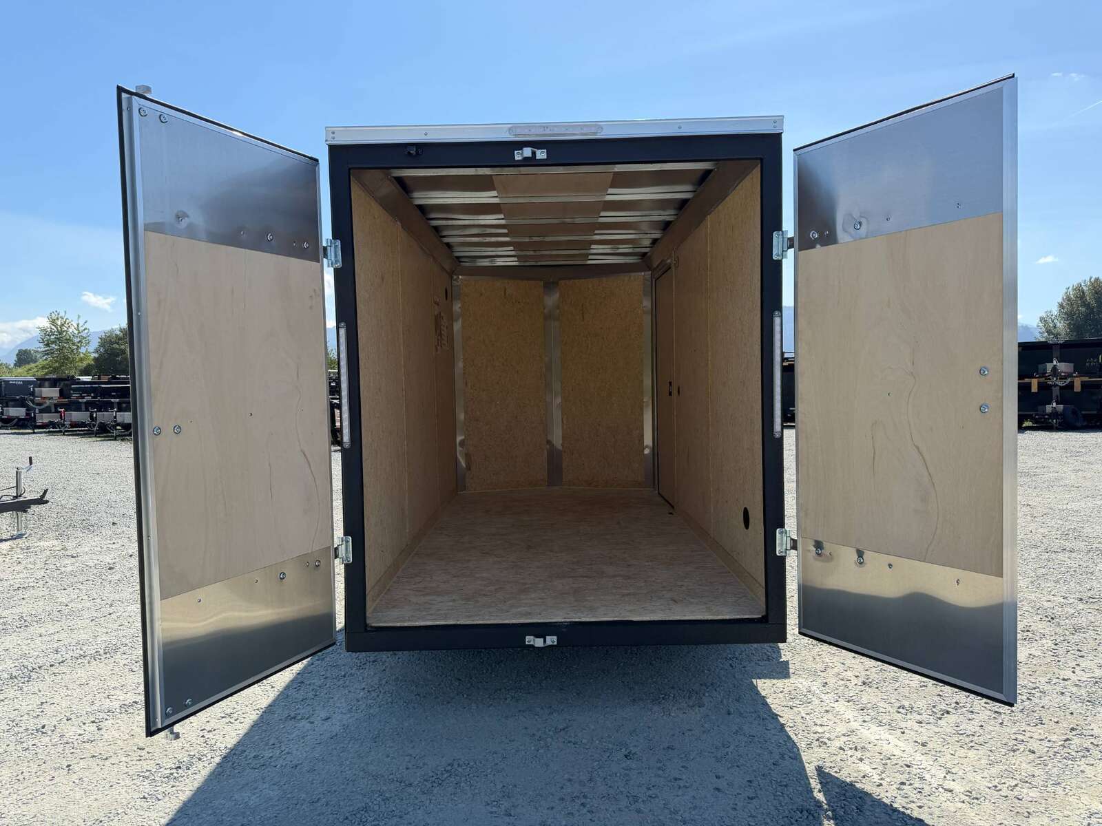 Photo of 2026 Impact Quake 6x12 V Nose Cargo / Enclosed Trailer Black Barn Door Extra Height 2990lb GVW