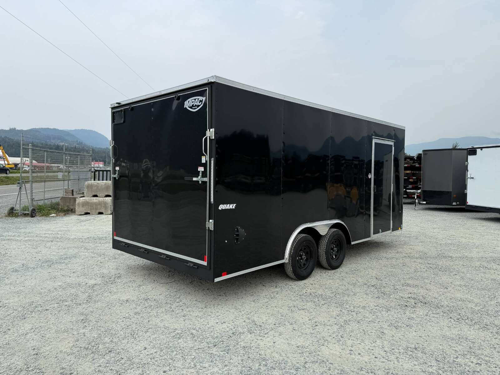 Photo of 2026 Impact 8.5x18 Quake V Nose Cargo Enclosed Trailer Ramp Door Extra Height Black 7000lb GVW