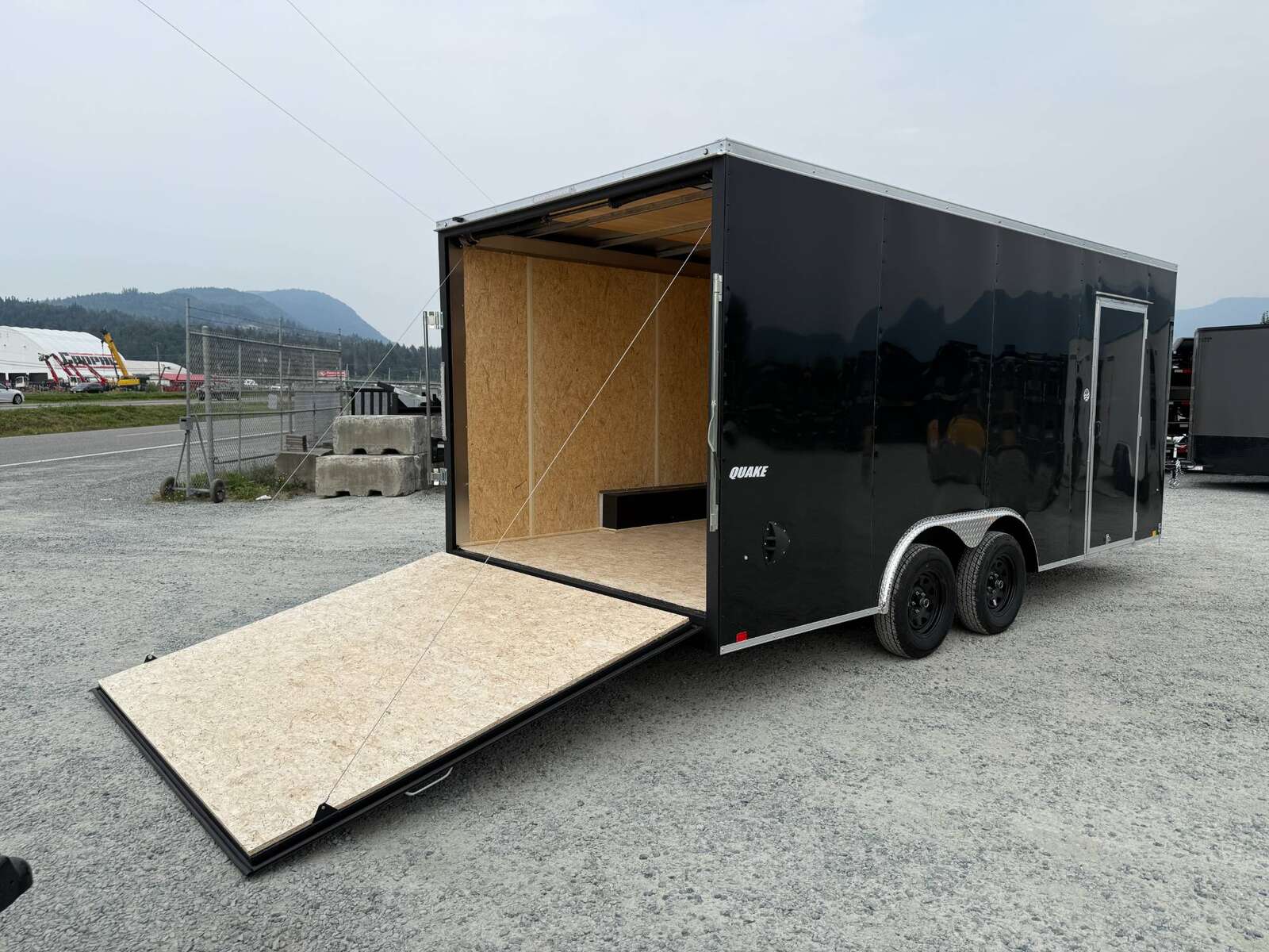 Photo of 2026 Impact 8.5x18 Quake V Nose Cargo Enclosed Trailer Ramp Door Extra Height Black 7000lb GVW