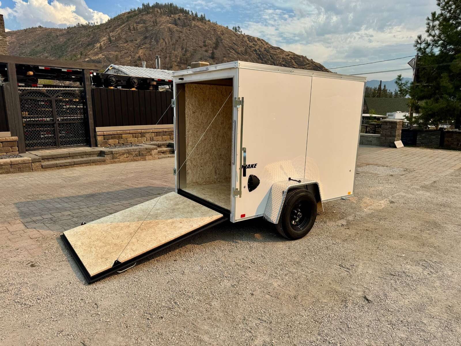 Photo of 2027 Impact Quake 5x8 V Nose Cargo / Enclosed Trailer White Ramp Door 2990lb GVW