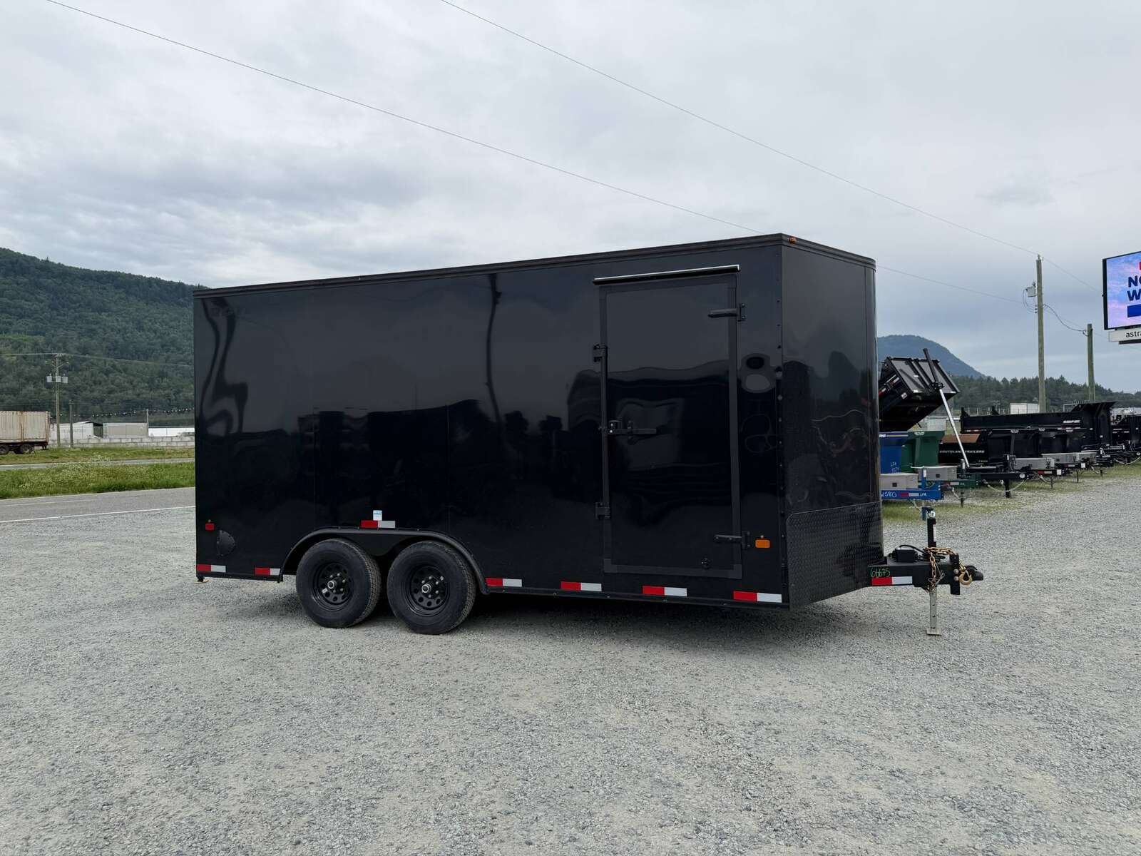 Photo of 2027 Royal Cargo 8.5X16 V NOSE Cargo / Enclosed Trailer Black w/ Blackout Package RAMP DOOR EXTRA HEIGHT 11,400LB GVW (GSR)