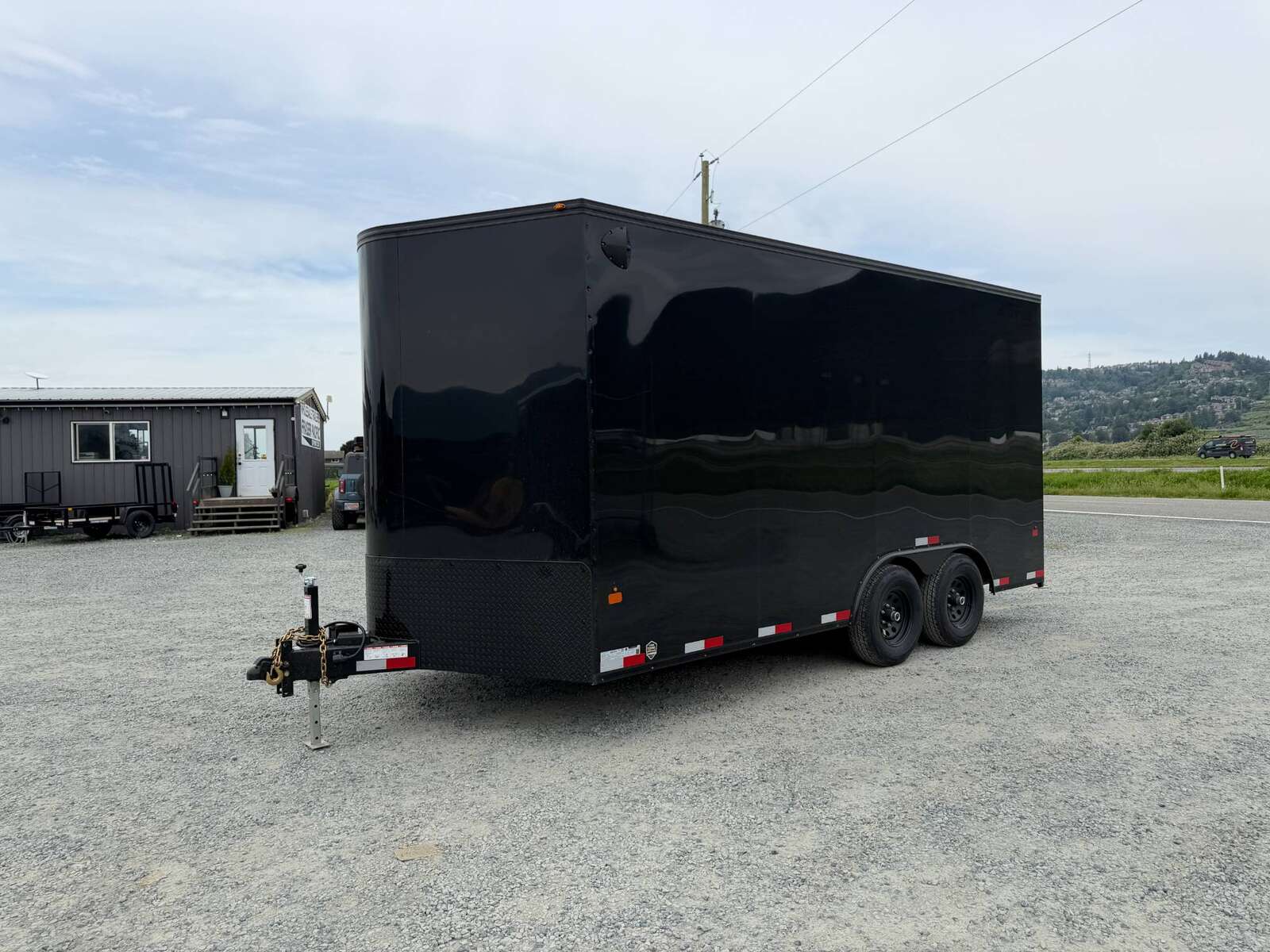 Photo of 2027 Royal Cargo 8.5X16 V NOSE Cargo / Enclosed Trailer Black w/ Blackout Package RAMP DOOR EXTRA HEIGHT 11,400LB GVW (GSR)