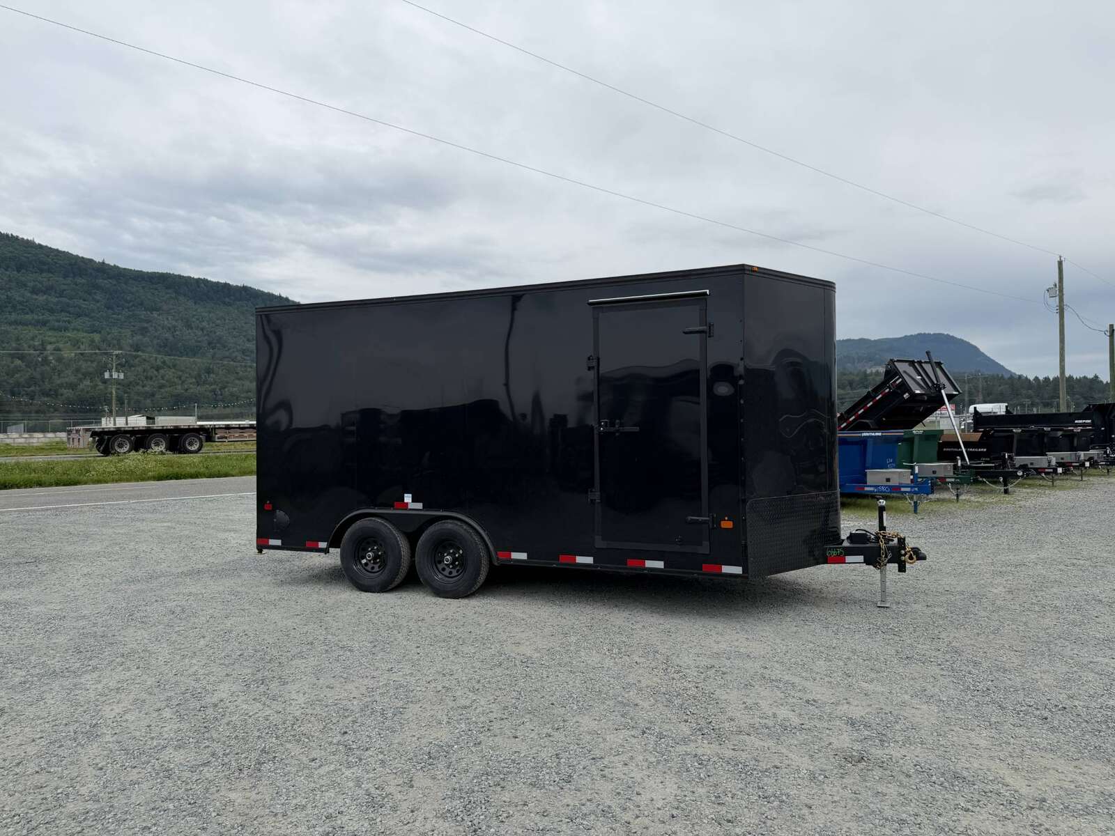 Photo of 2027 Royal Cargo 8.5X16 V NOSE Cargo / Enclosed Trailer Black w/ Blackout Package RAMP DOOR EXTRA HEIGHT 11,400LB GVW (GSR)
