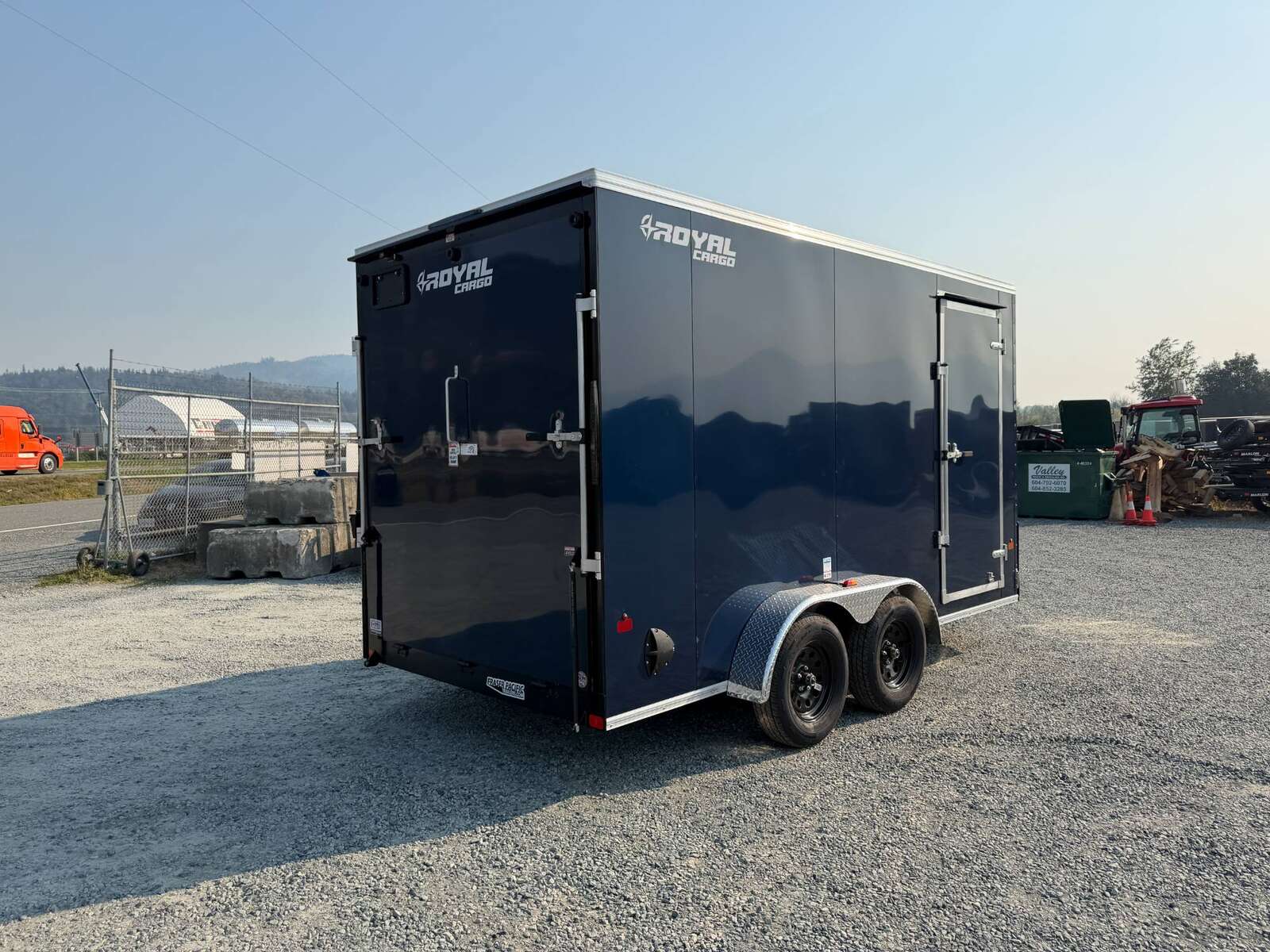 Photo of 2027 Royal Cargo 7X14 V Nose 7700LB GVW RAMP DOOR Blue Enclosed Cargo Trailer Extra Tall (GSR)
