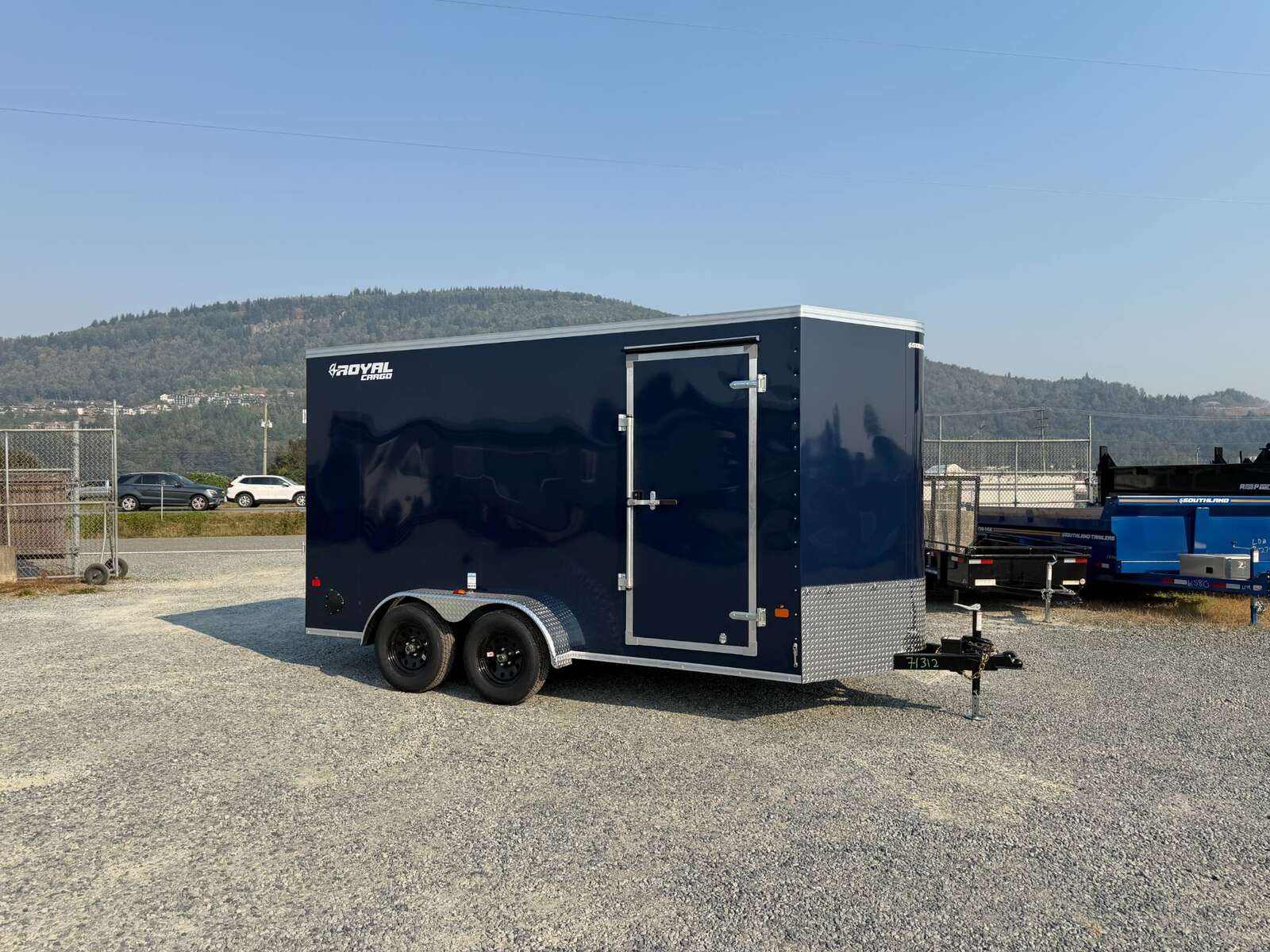 Photo of 2027 Royal Cargo 7X14 V Nose 7700LB GVW RAMP DOOR Blue Enclosed Cargo Trailer Extra Tall (GSR)