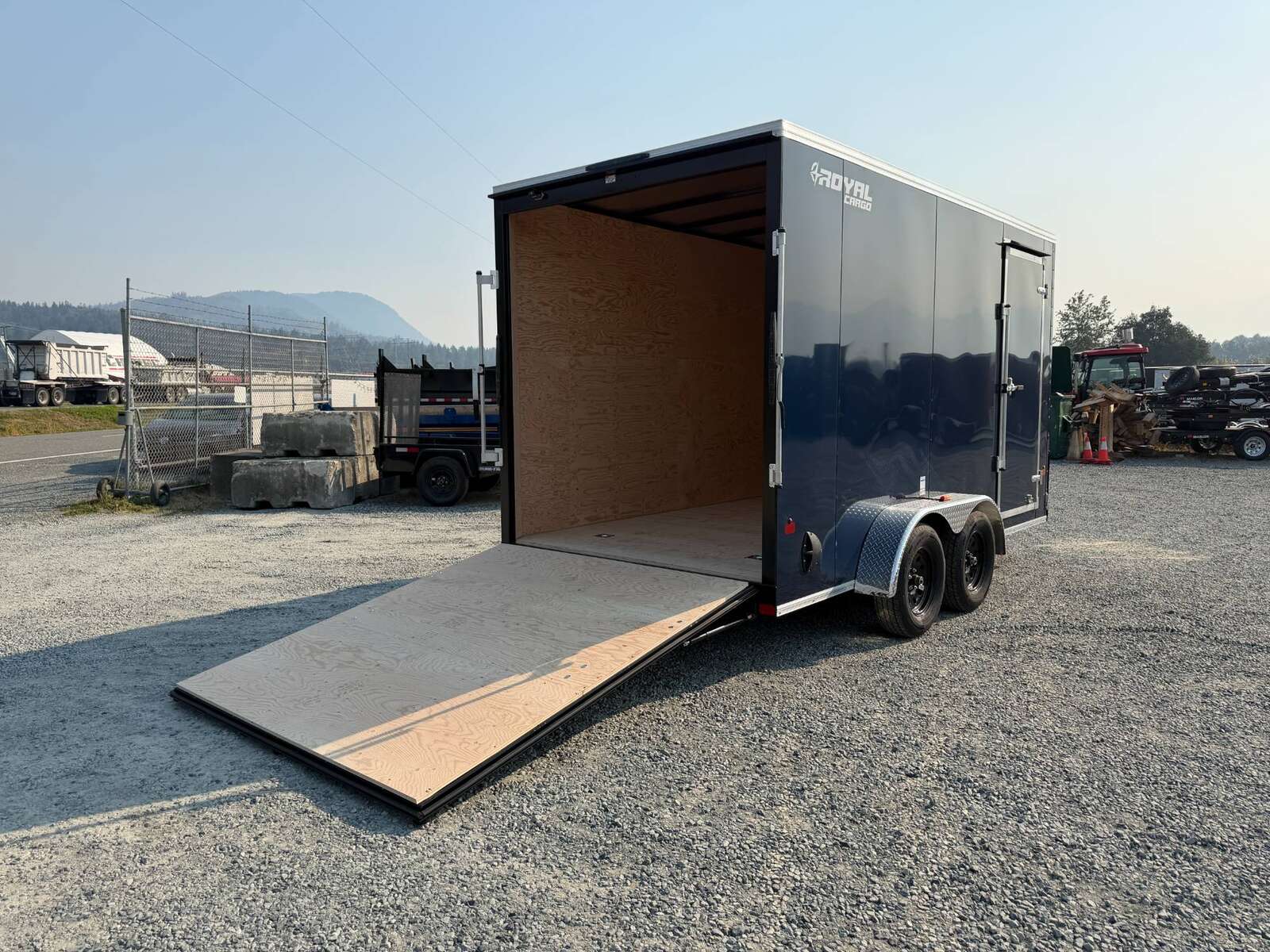 Photo of 2027 Royal Cargo 7X14 V Nose 7700LB GVW RAMP DOOR Blue Enclosed Cargo Trailer Extra Tall (GSR)