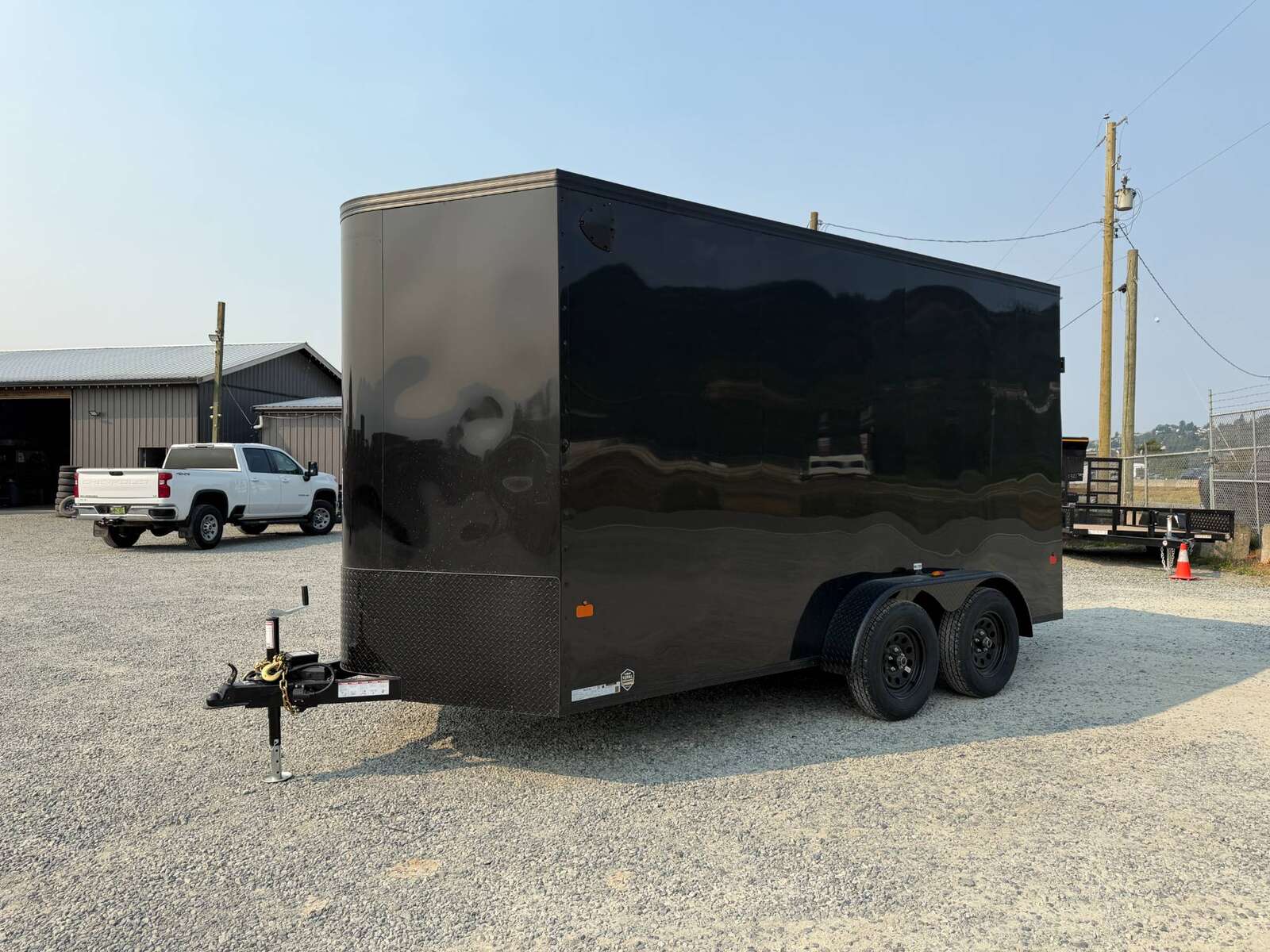 Photo of 2027 Royal Cargo 7X14 V Nose 7700LB GVW RAMP DOOR Black w/ Blackout Package Enclosed Cargo Trailer Extra Tall