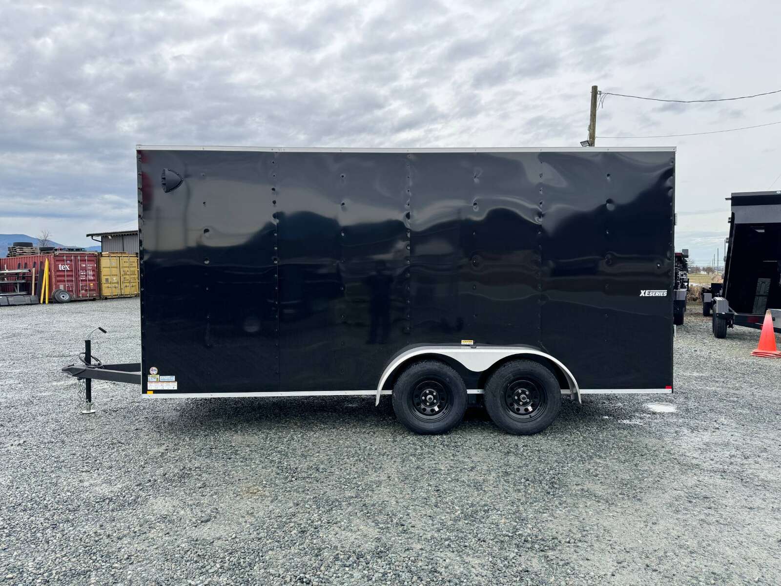 Photo of 2025 Mirage XE 7X16 V-Nose Ramp Door Cargo / Enclosed Trailer Extra Height Black 7000lb GVW