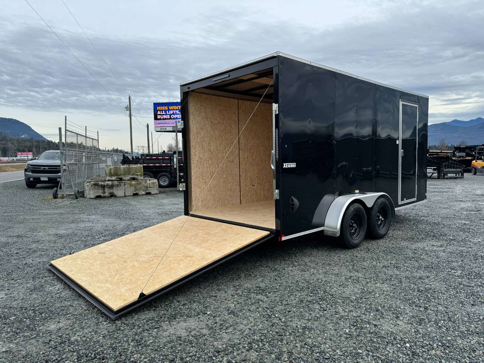 Photo of 2025 Mirage XE 7X16 V-Nose Ramp Door Cargo / Enclosed Trailer Extra Height Black 7000lb GVW