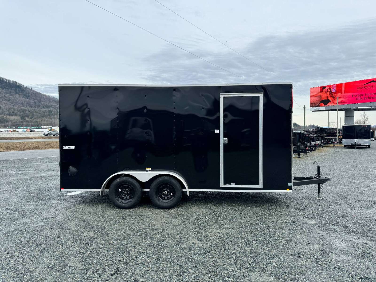 Photo of 2025 Mirage XE 7X16 V-Nose Ramp Door Cargo / Enclosed Trailer Extra Height Black 7000lb GVW