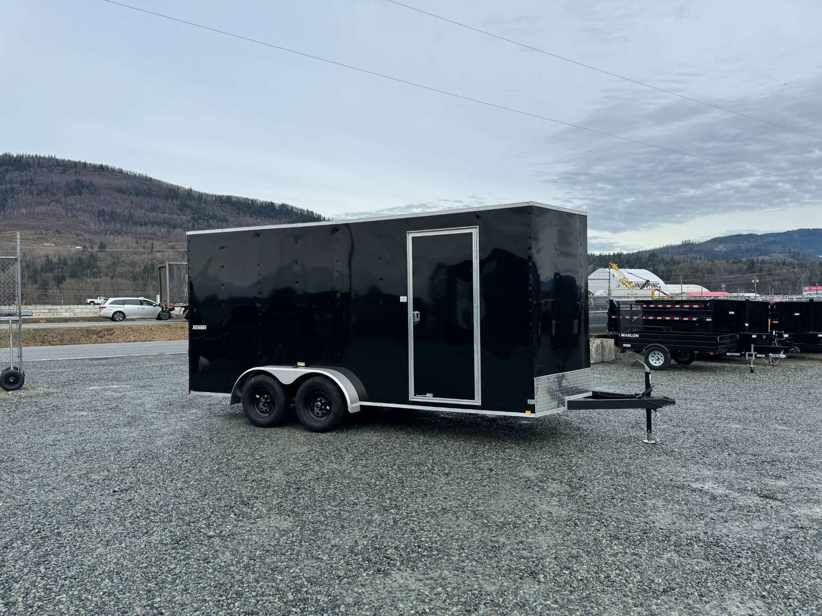 Photo of 2025 Mirage XE 7X16 V-Nose Ramp Door Cargo / Enclosed Trailer Extra Height Black 7000lb GVW