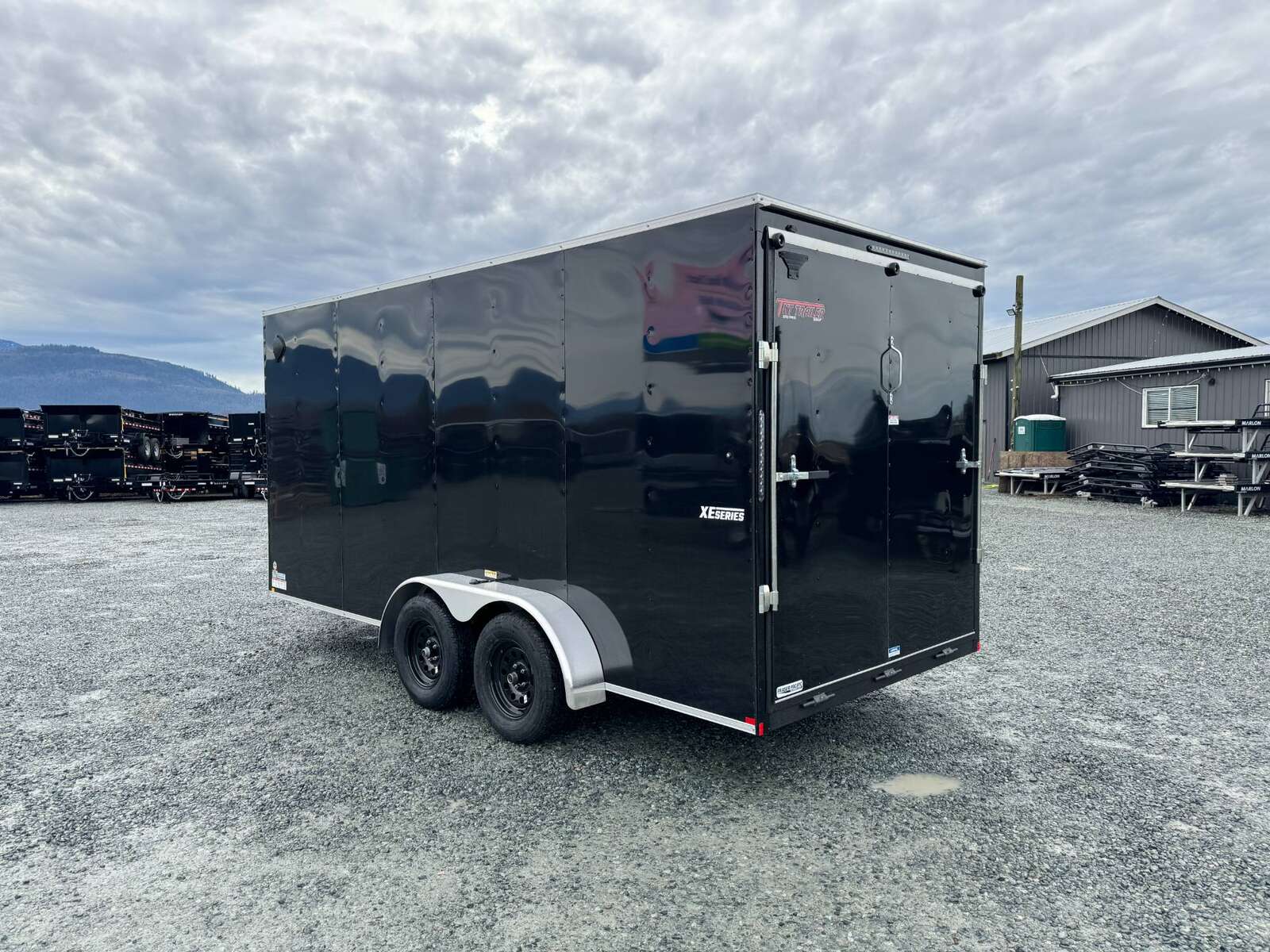 Photo of 2025 Mirage XE 7X16 V-Nose Ramp Door Cargo / Enclosed Trailer Extra Height Black 7000lb GVW