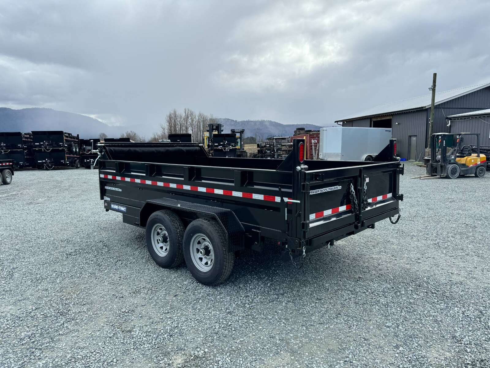 Photo of 2025 Suretrac 7x14 Telescopic Hoist Dump Trailer 14,000lbs GVW w/ Ramps and Tarp