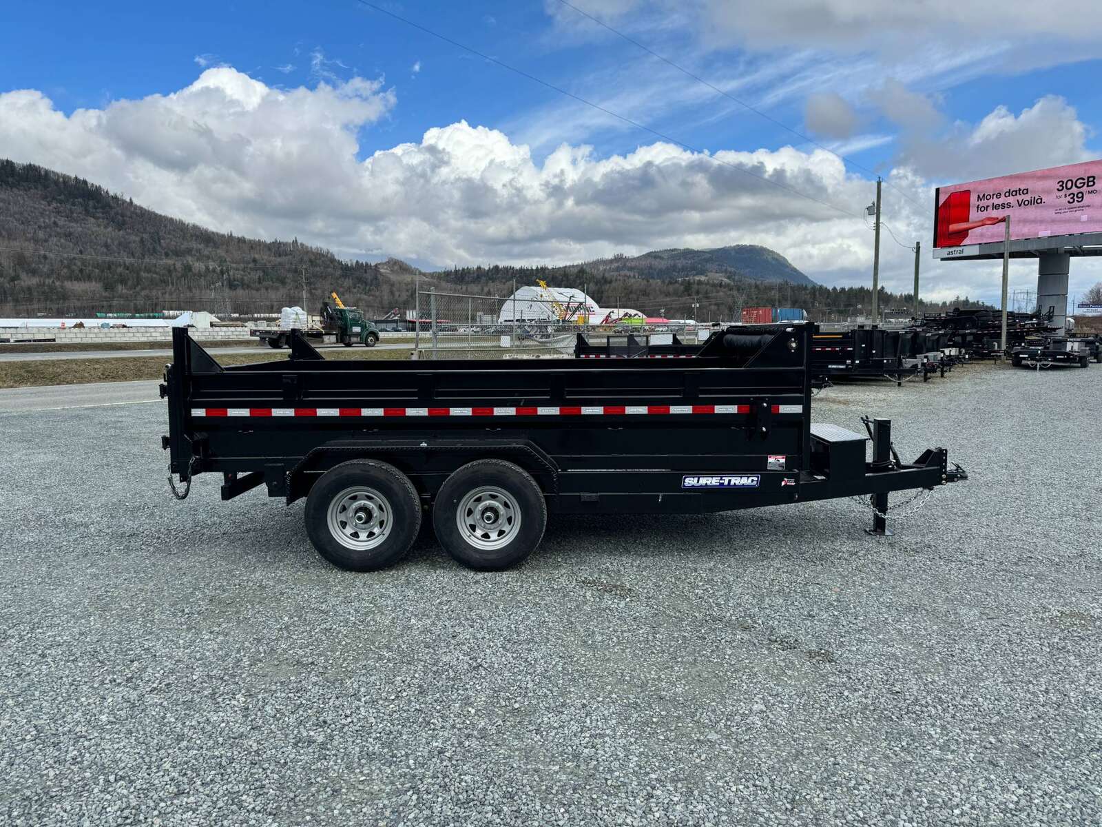 Photo of 2025 Suretrac 7x14 Telescopic Hoist Dump Trailer 14,000lbs GVW w/ Ramps and Tarp